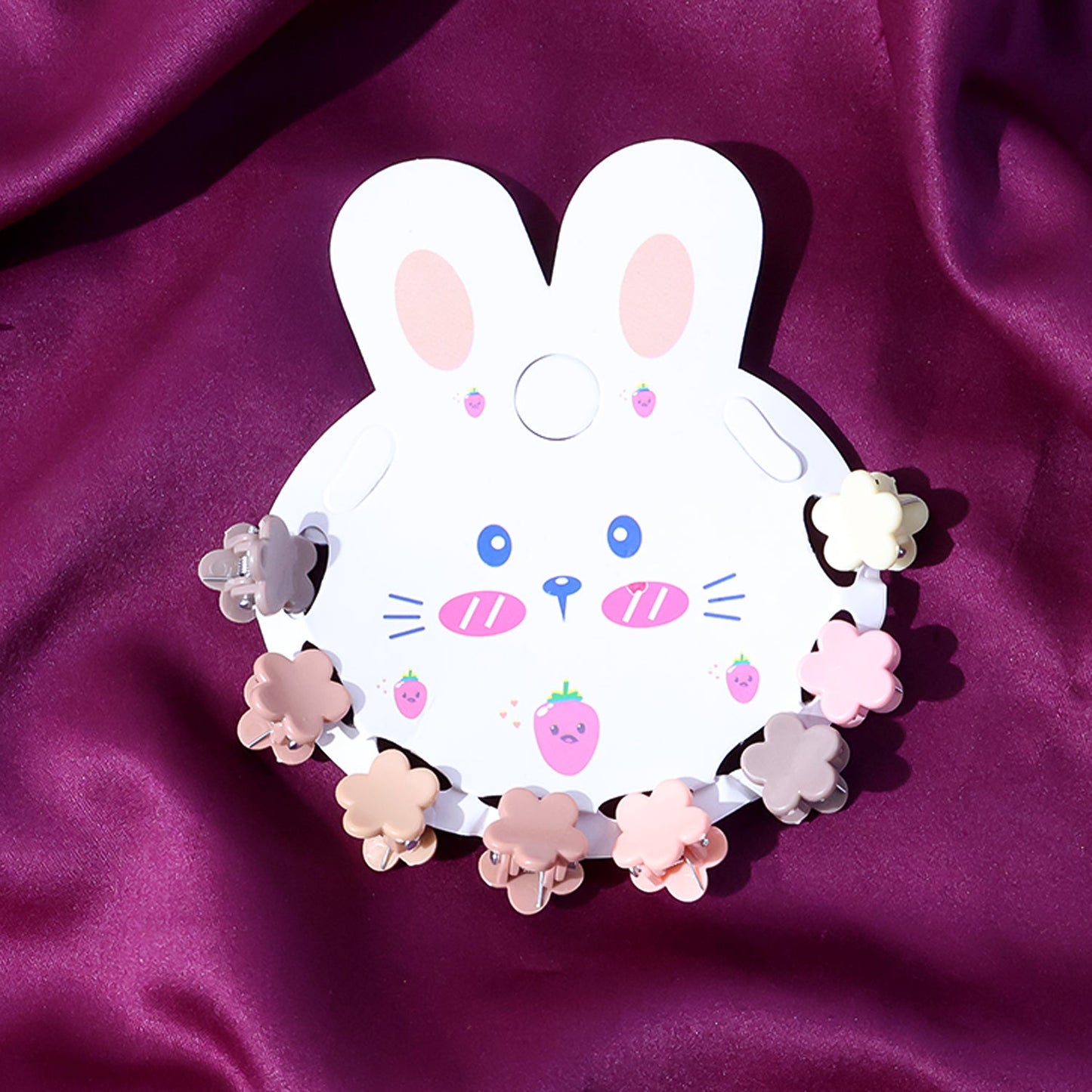 Close-up view of colorful mini hair claw clips designed for kids