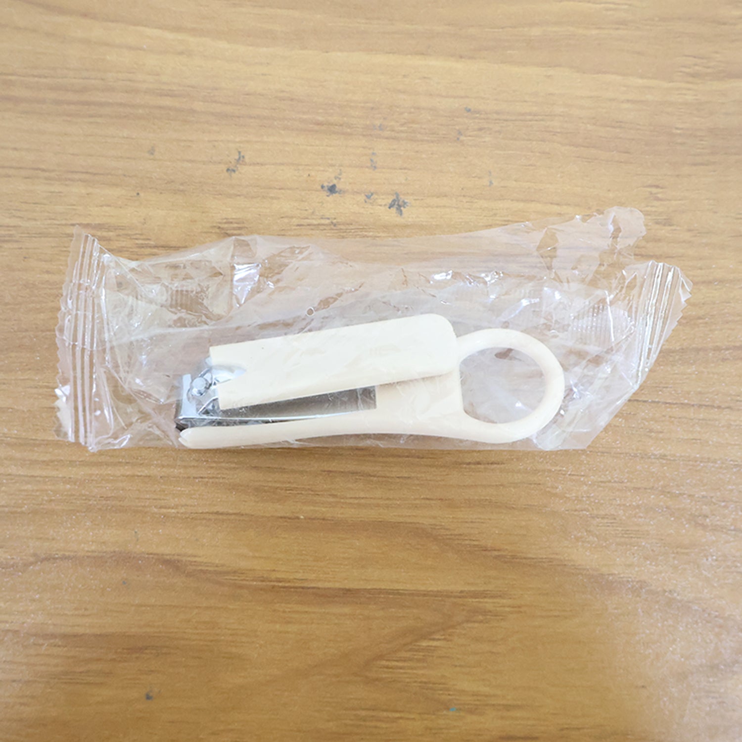 Ergonomic nail clipper showing smooth curved blades and anti-slip surface