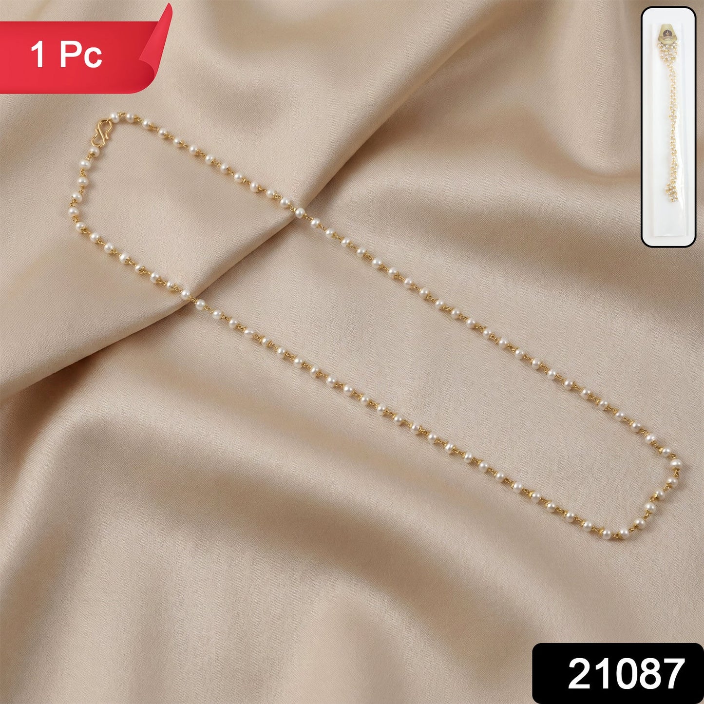 Gold-tone link chain necklace featuring pearl beads