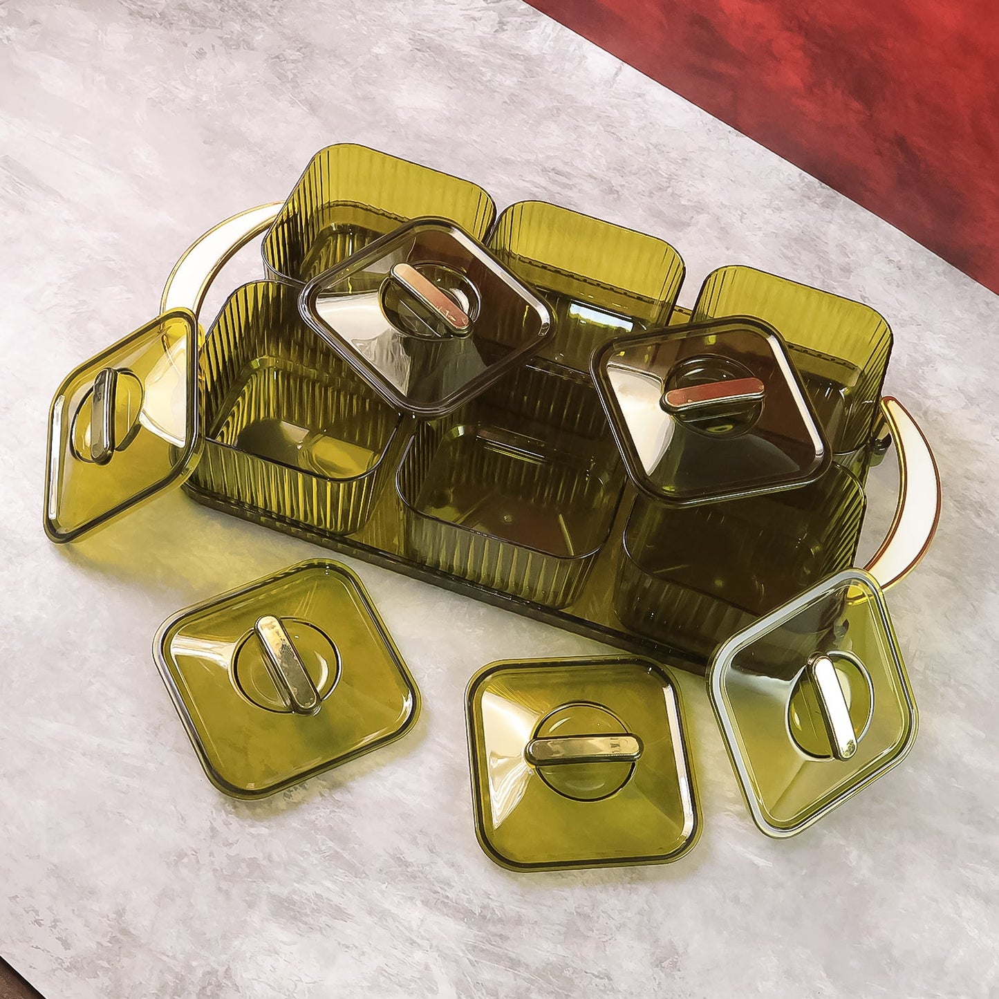 Side view of transparent multipurpose spice jar set with tray