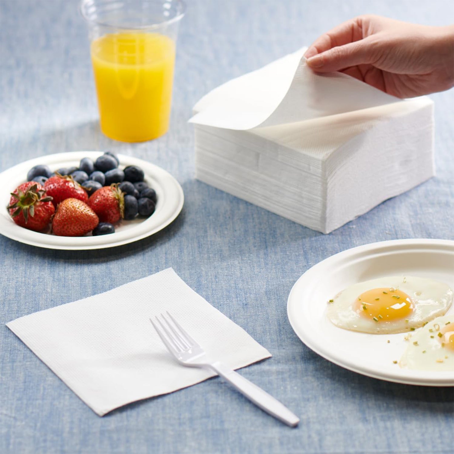 Plush feel absorbent tissue paper napkins in square fold design.