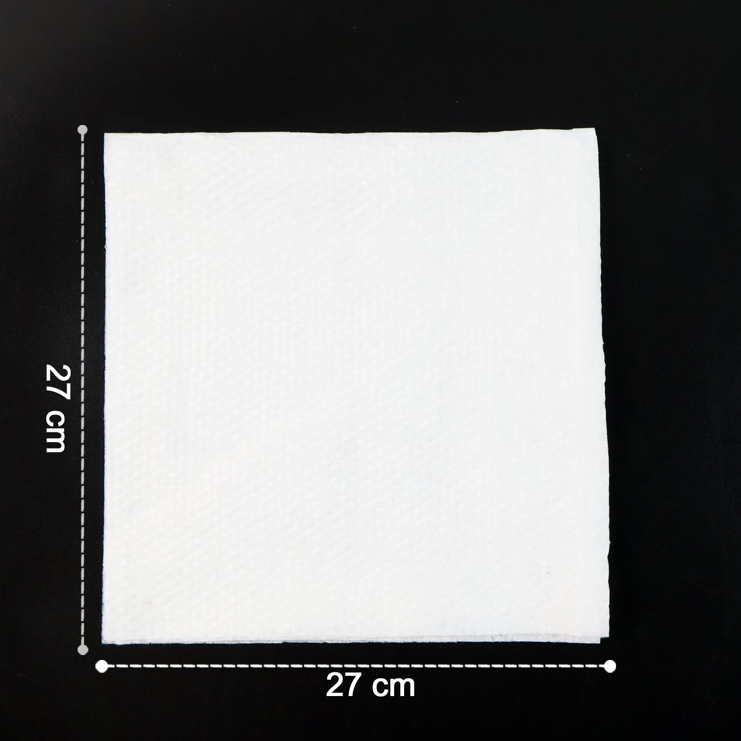 Multicolor tissue paper elegantly folded and used as a disposable table napkin.