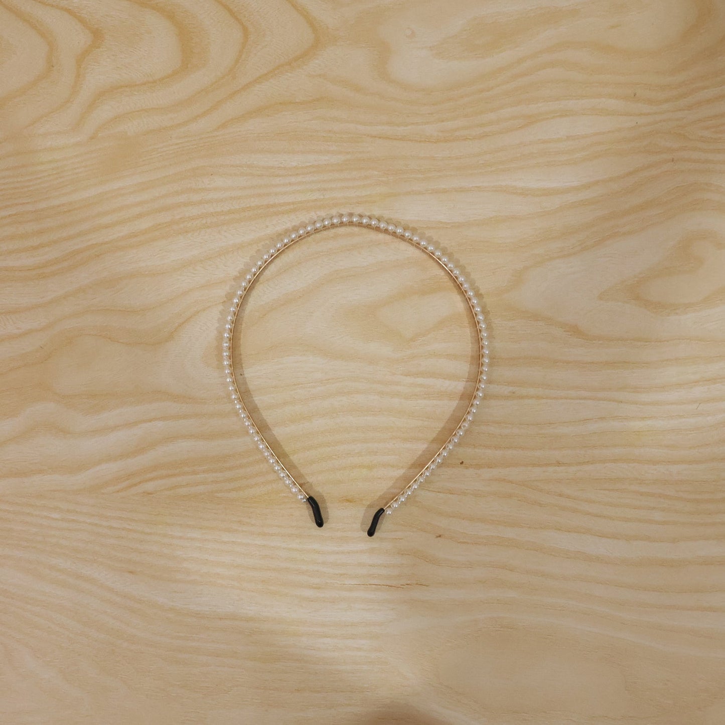 Versatile pearl hairband for casual and festive styling