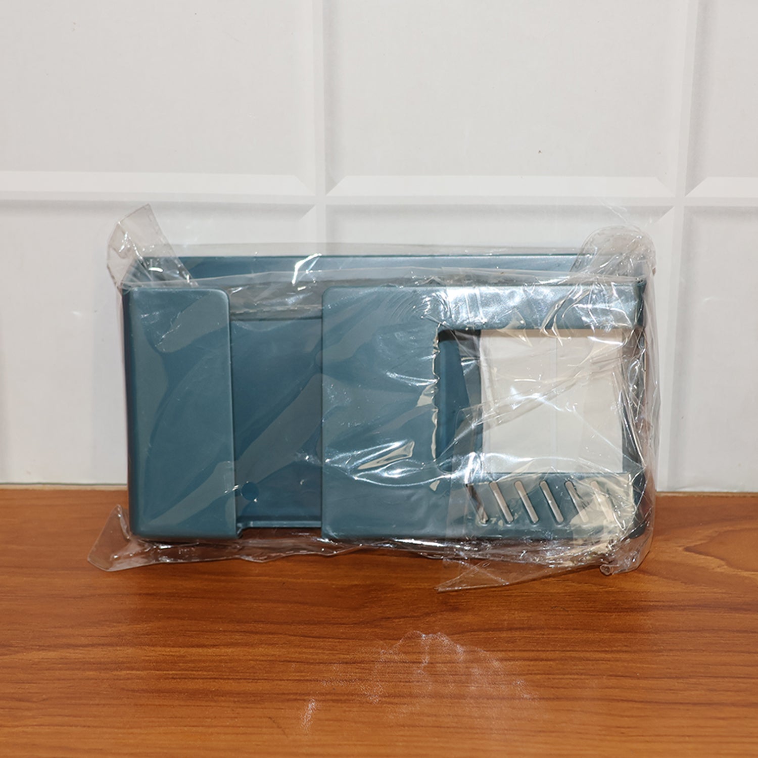 Functional wall mounted storage holder for mobiles and remotes