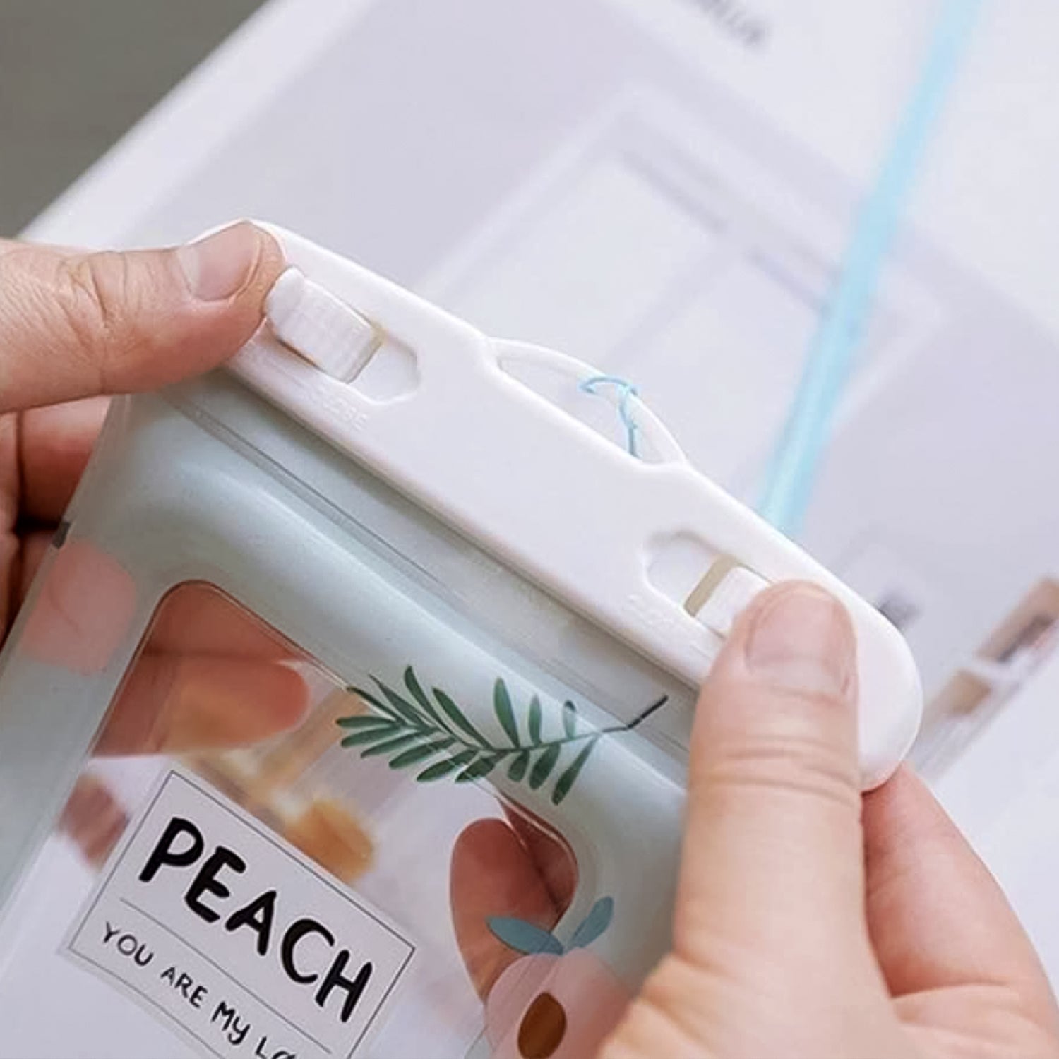 Waterproof phone pouch with stylish peach leaf design for travel and outdoor use