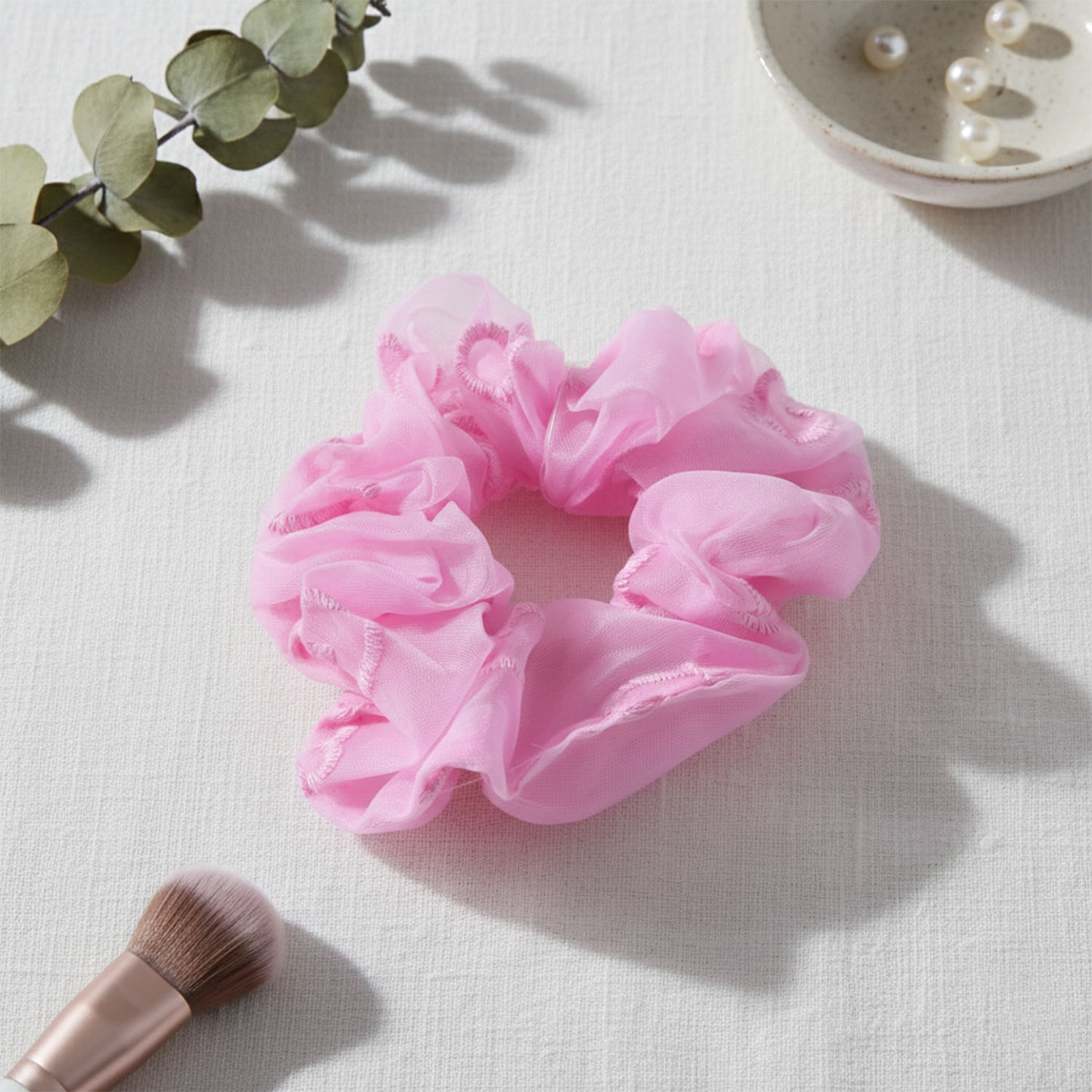 Cloth-covered elastic hair tie ideal for gentle no-pull hair styling