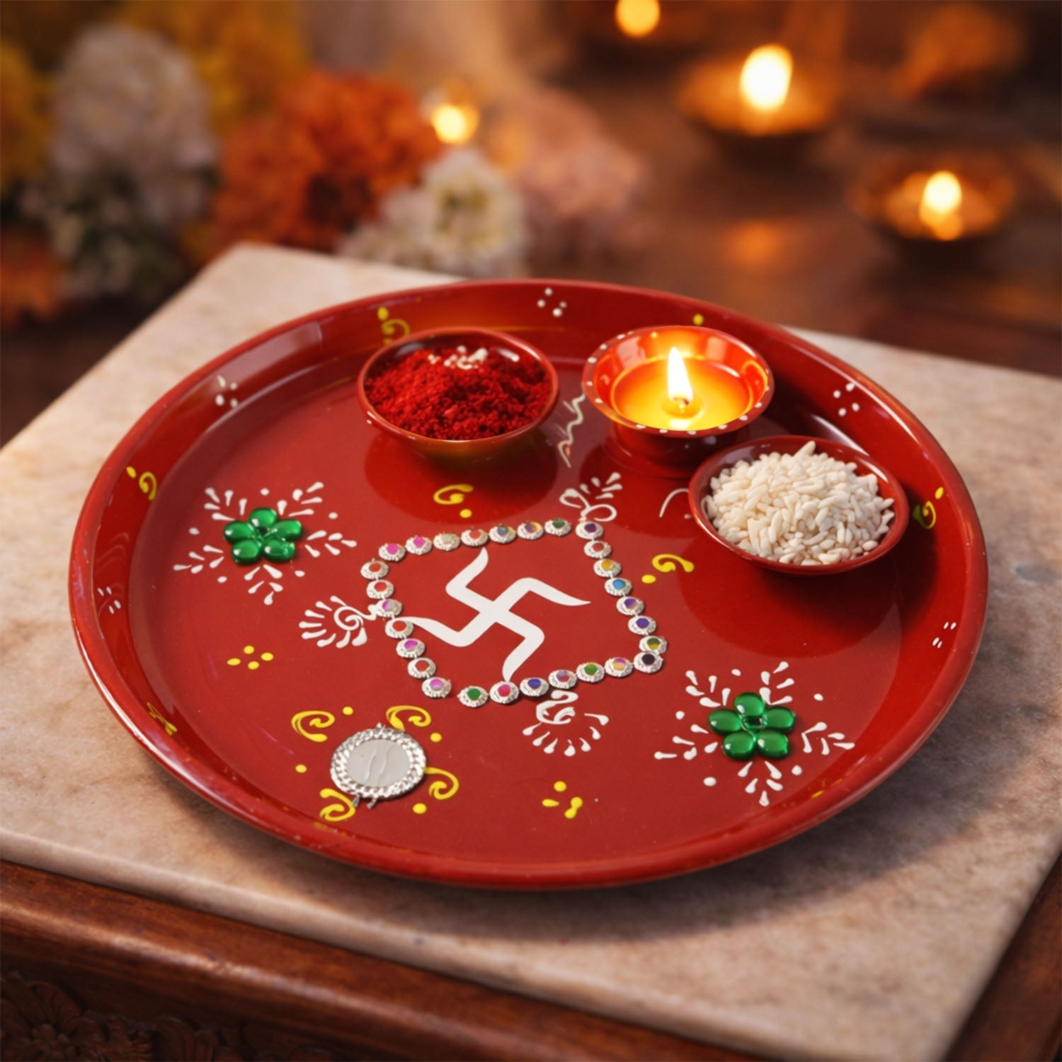 Festive pooja thali with intricate hand-painted designs and stone embellishments