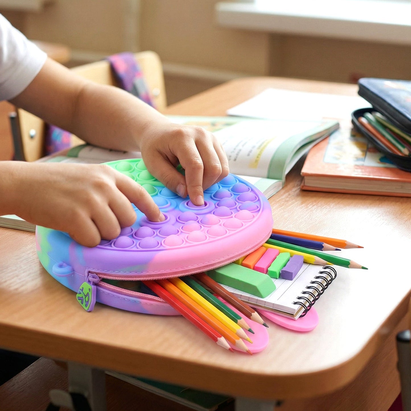 Rainbow caterpillar Pop It silicone pencil case with stress-relief bubbles