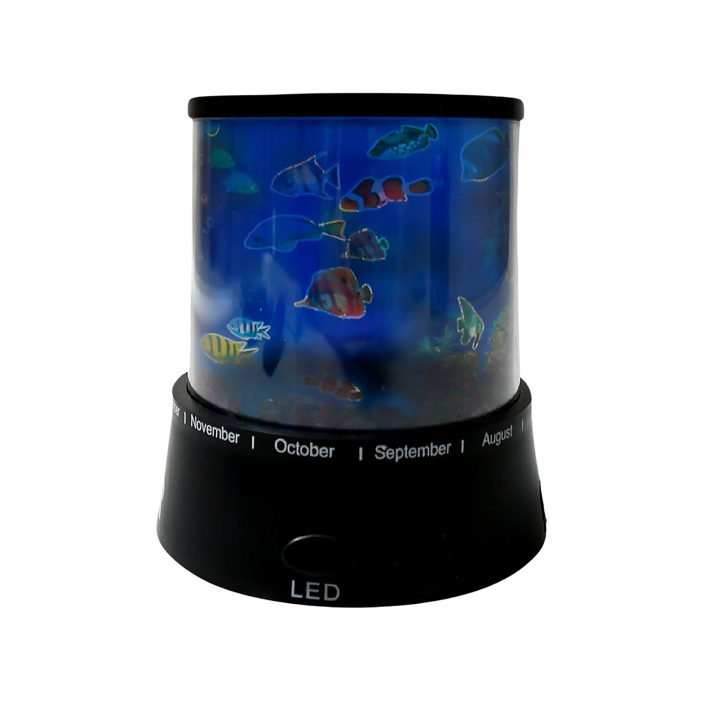 A child's bedroom bathed in the calming blue and green light from the star projector lamp.