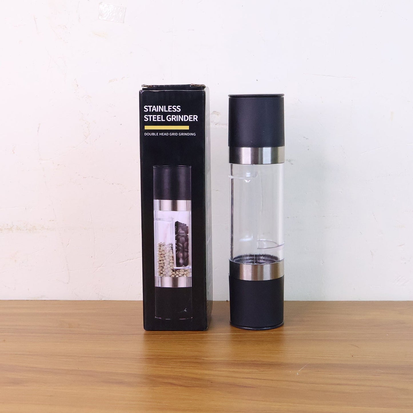 Another angle of salt and pepper grinder highlighting its dual compartments