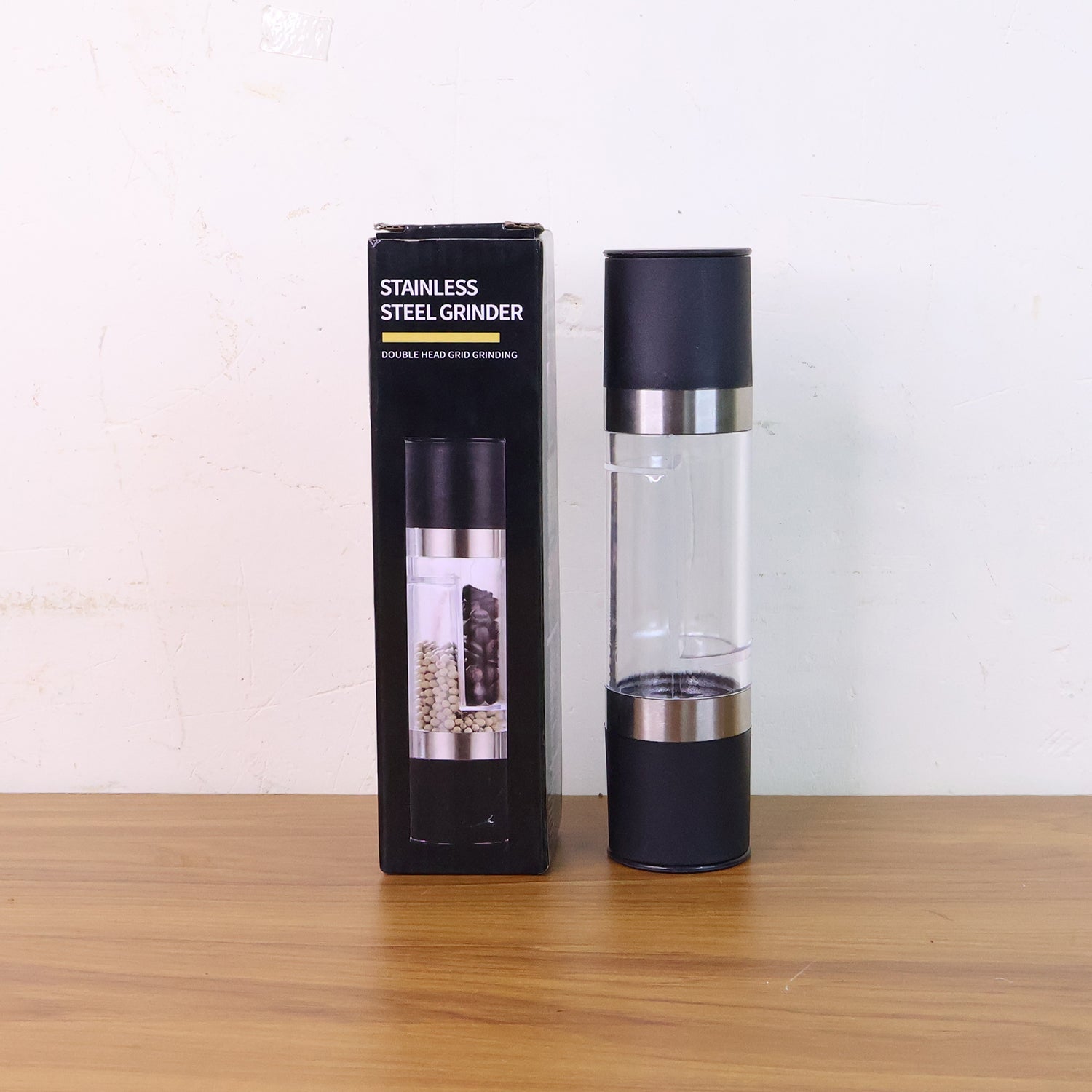 Another angle of salt and pepper grinder highlighting its dual compartments