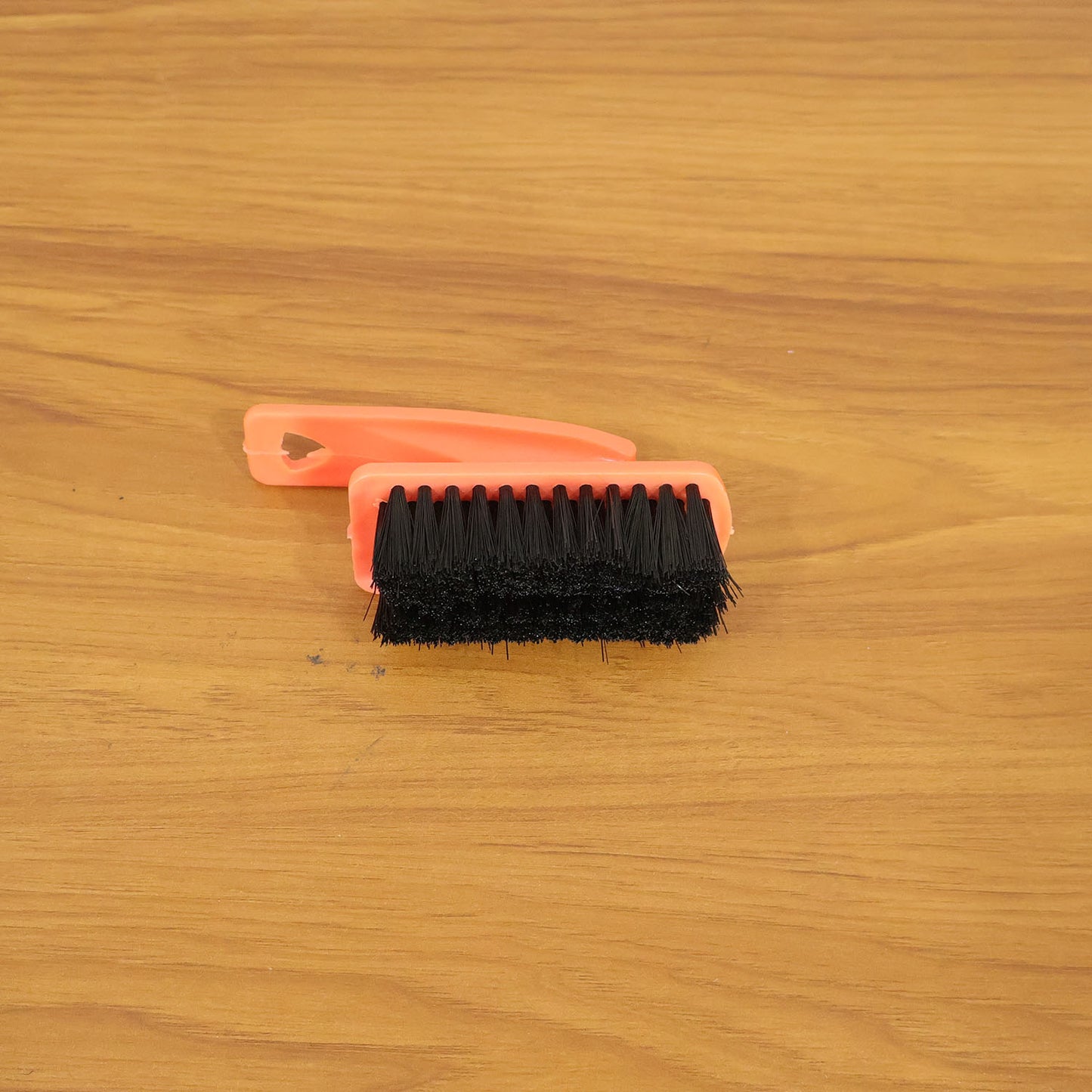 Shoe cleaning brush in live use cleaning sneakers and household surfaces