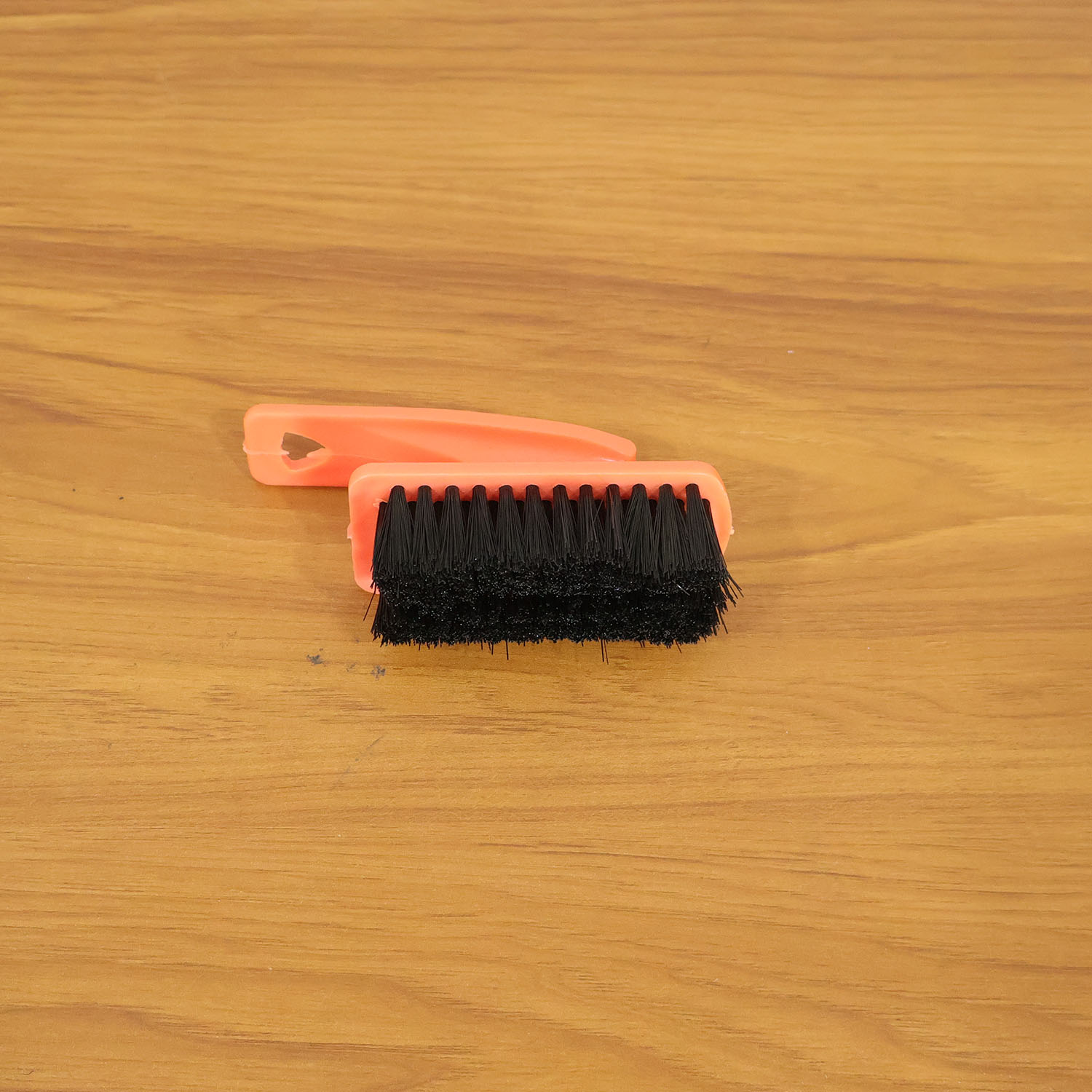 Shoe cleaning brush in live use cleaning sneakers and household surfaces