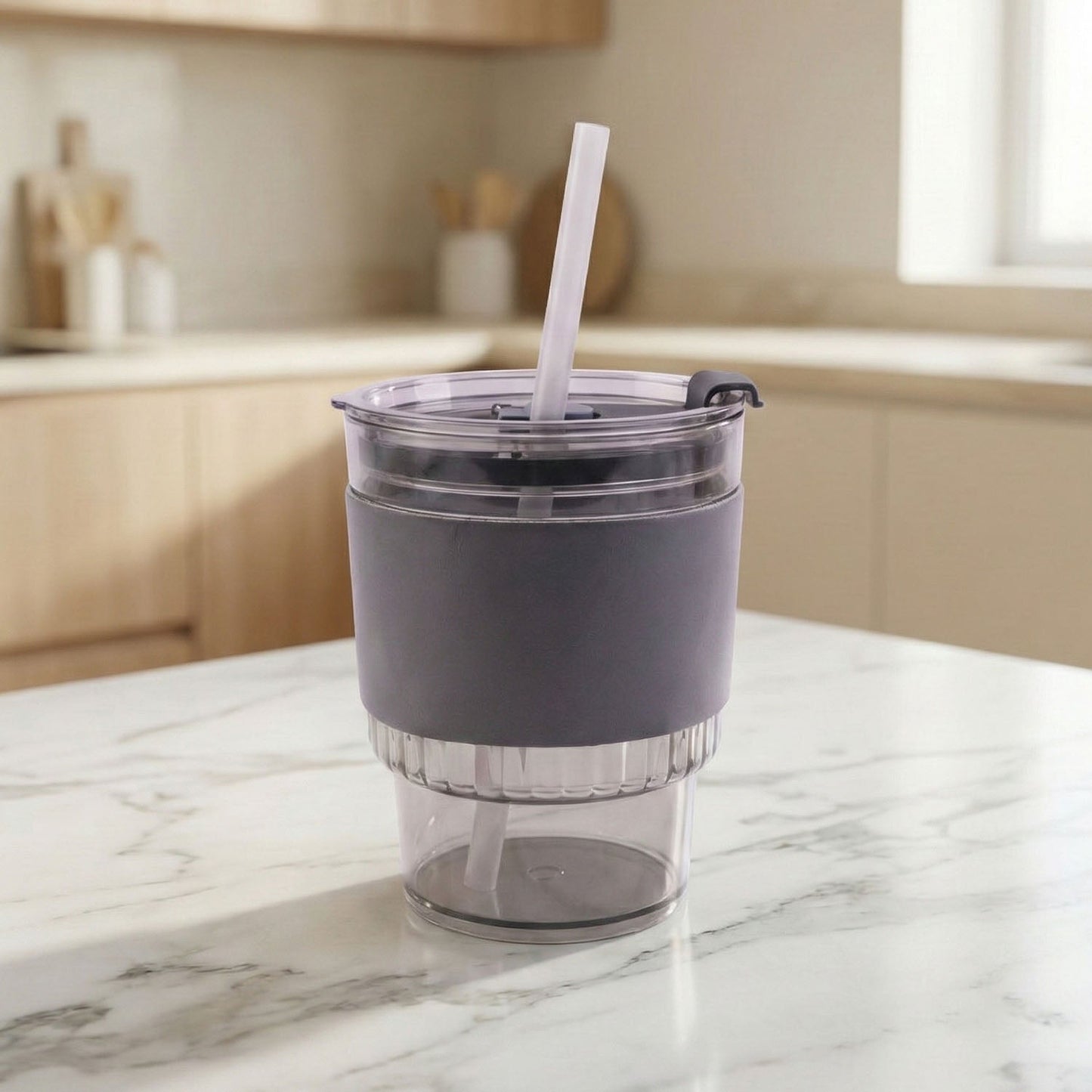 Side view of the 400ml clear plastic tumbler, highlighting its sleek design.