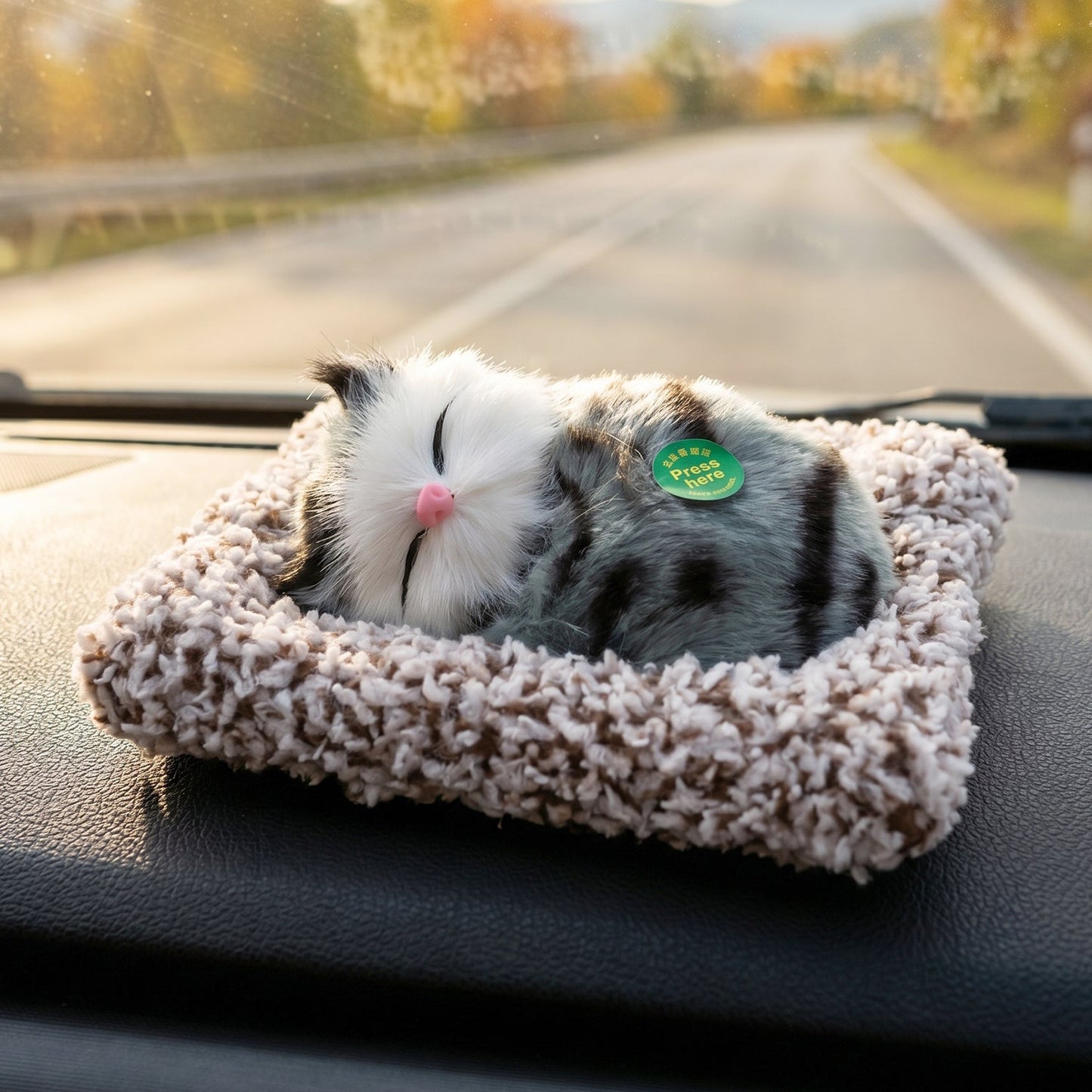 Close view of plush cat showpiece showing details