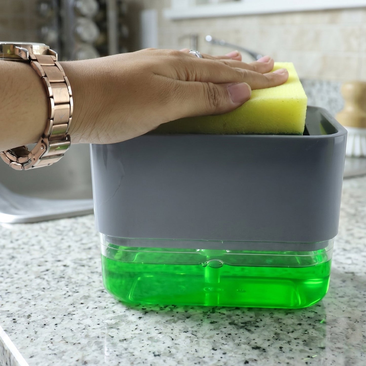 Space-efficient kitchen soap dispenser with sponge storage