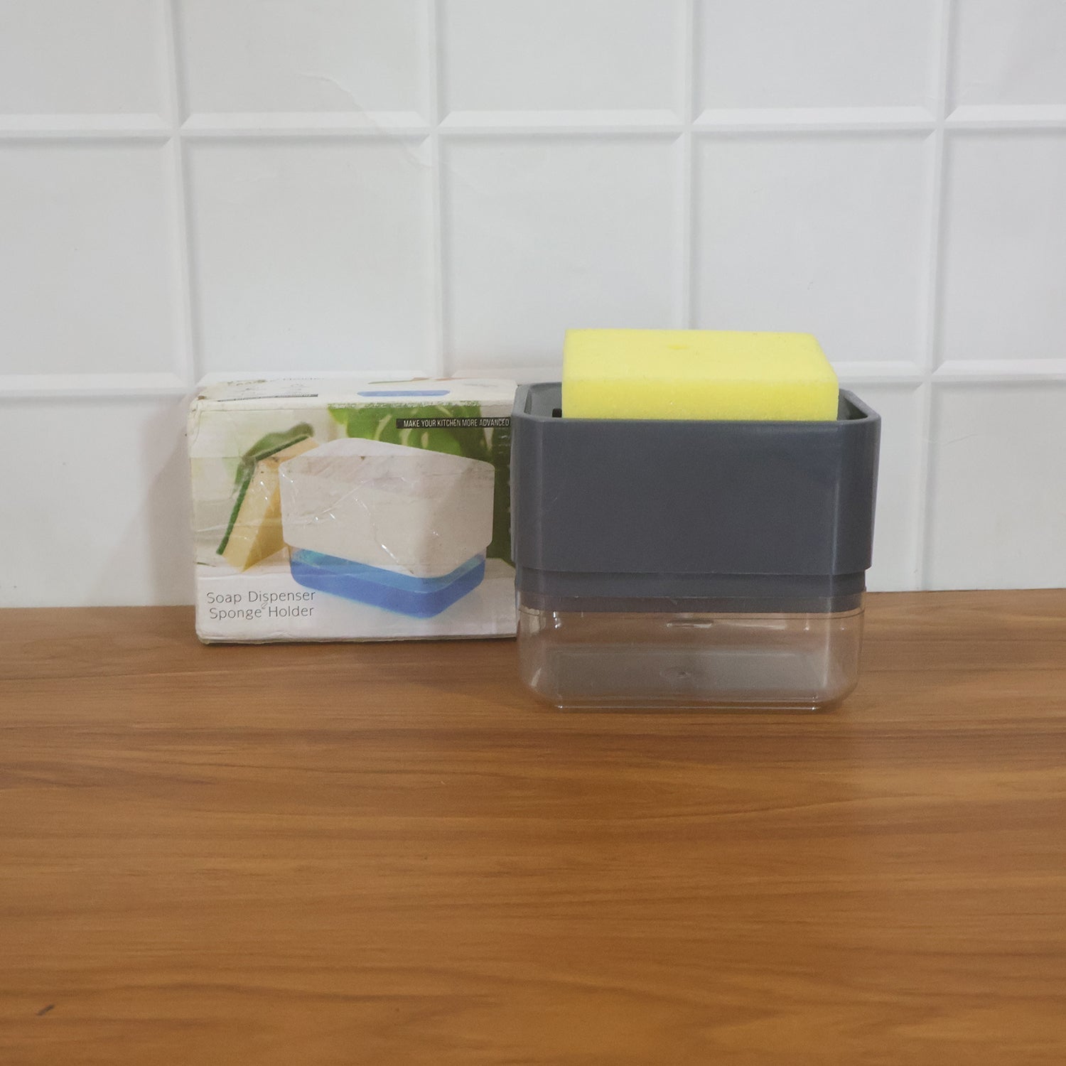 Neatly arranged kitchen sink organizer with soap and sponge