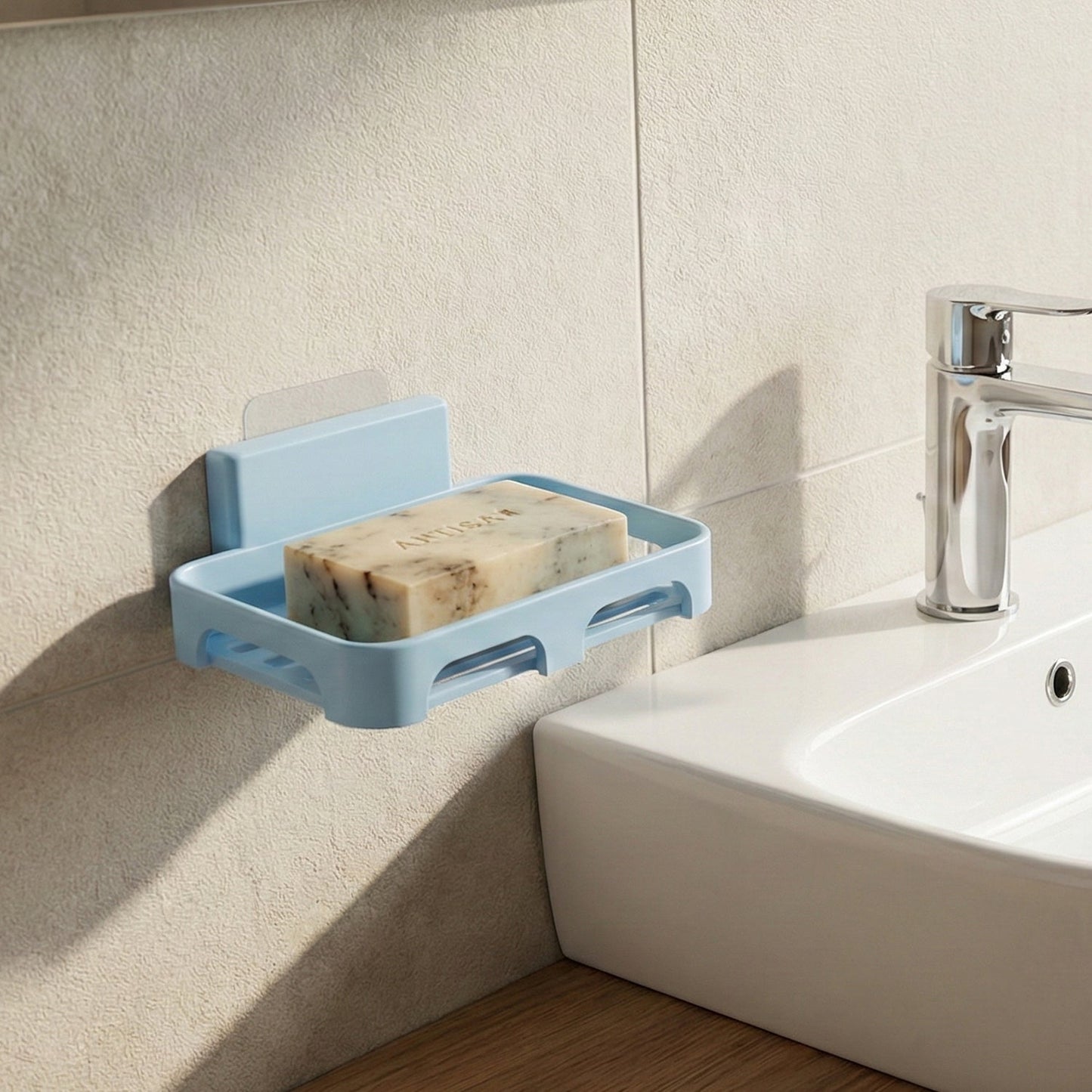 Durable plastic soap dish featuring water drainage slots