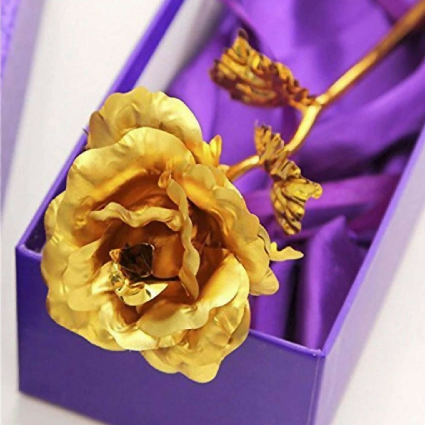 Close-up image of luxury gold plated artificial rose