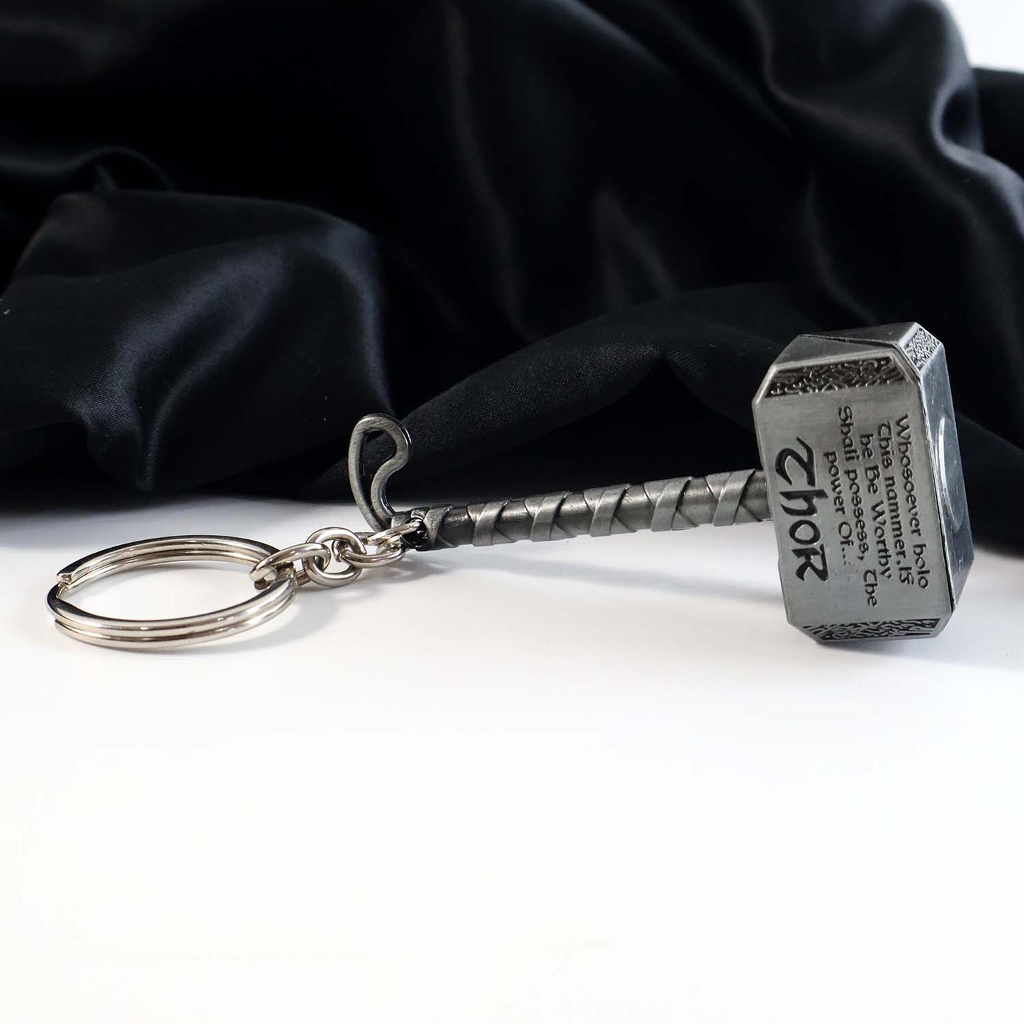 Close-up of hammer handles and metal alloy keychain detail