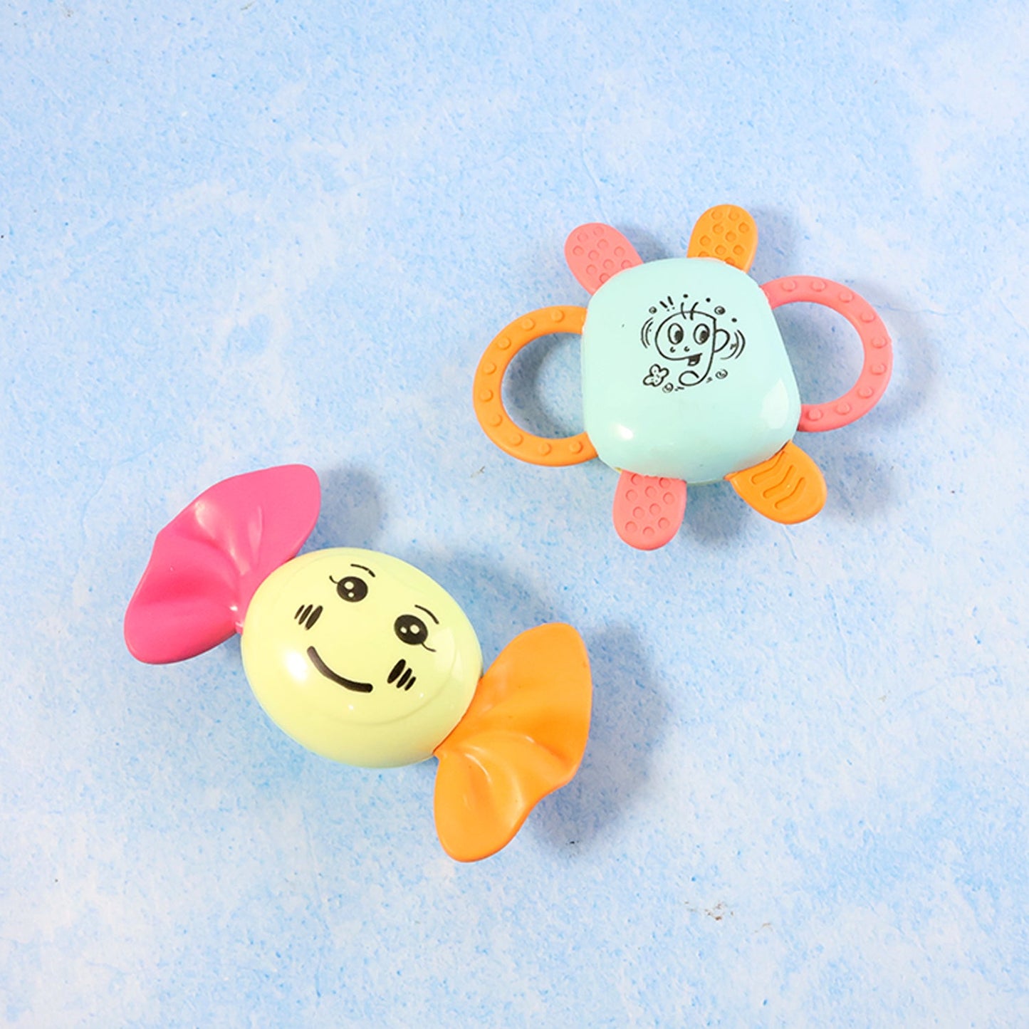 Single colorful baby rattle from Tiny Joys set crafted for easy grip