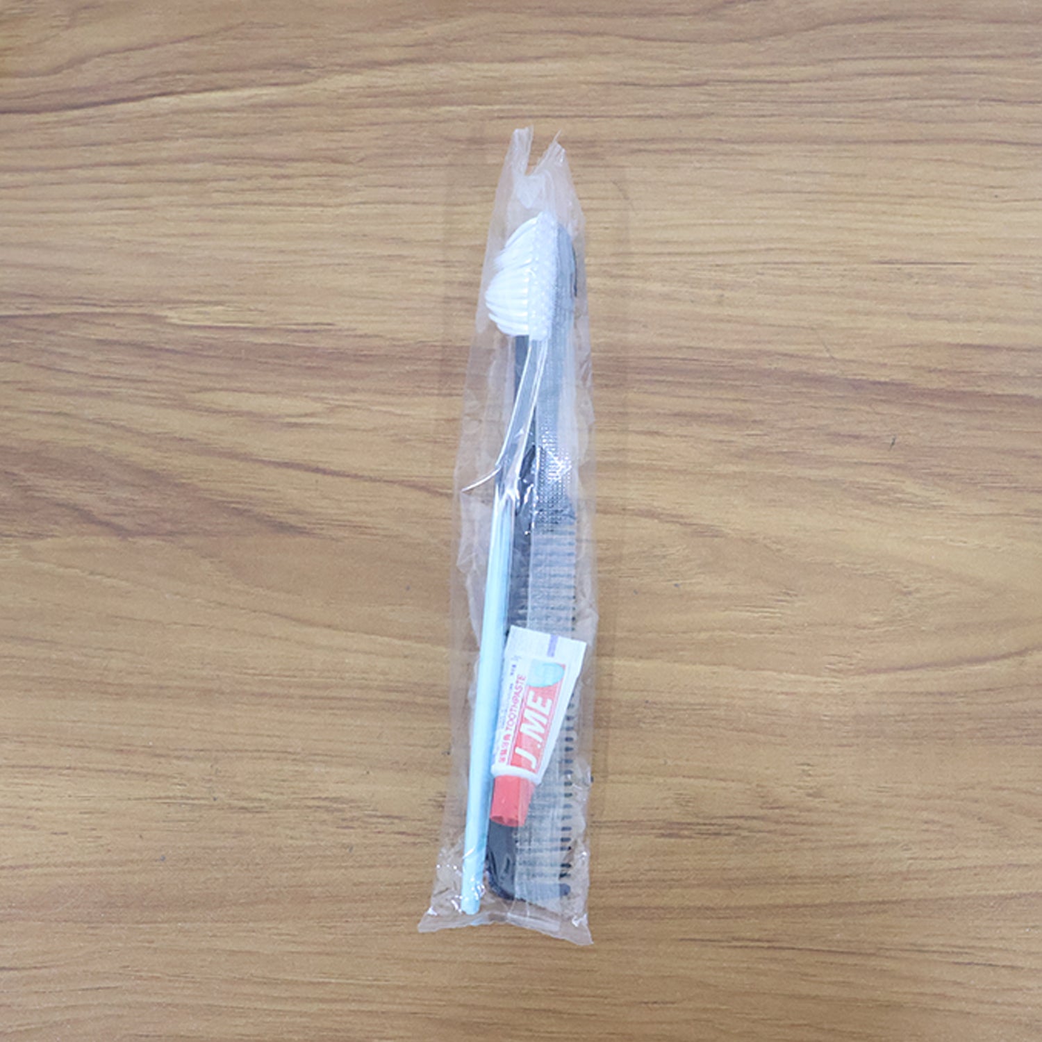 Travel-friendly toothbrush and comb personal care kit for on-the-go freshness