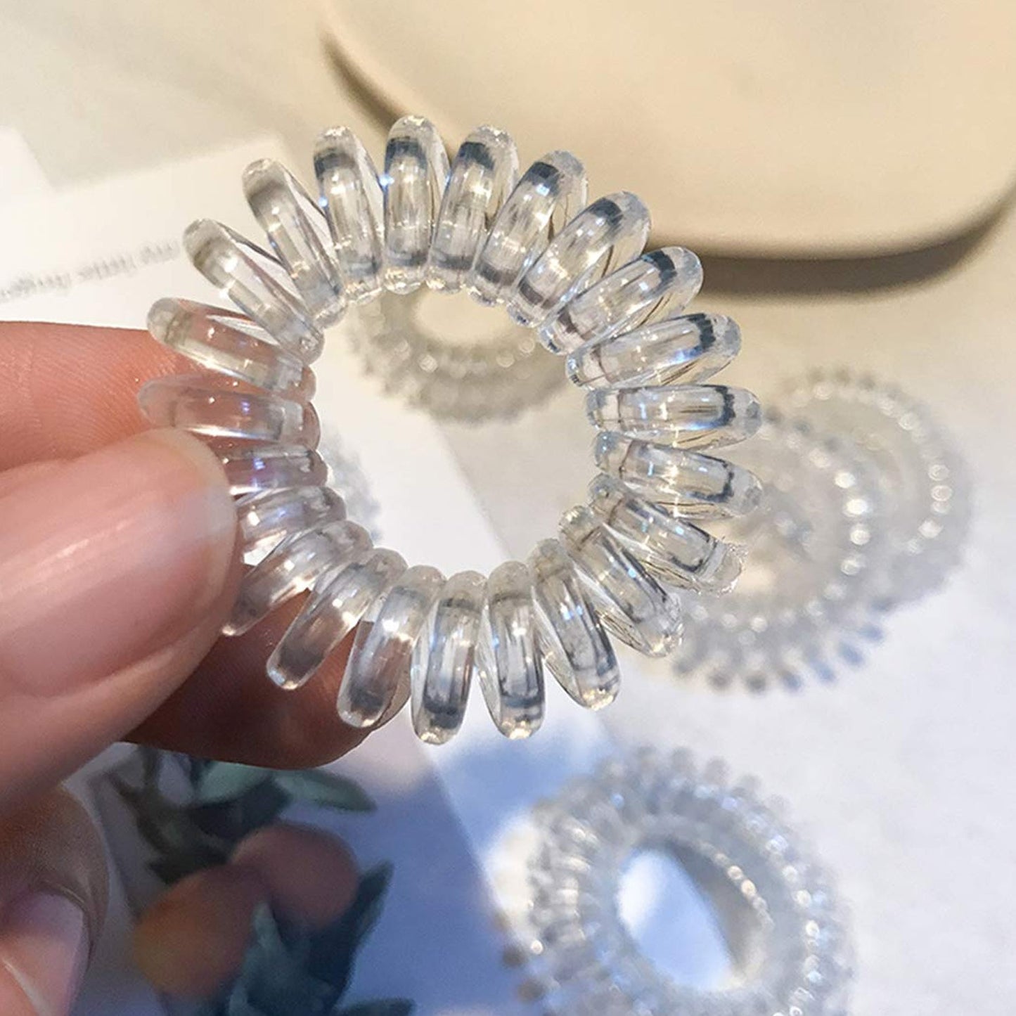 Strong and flexible transparent hair ties