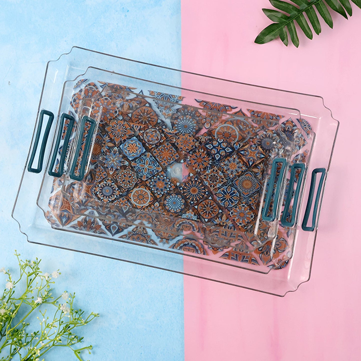 Stacked Supermom serving trays illustrating space-saving nesting feature