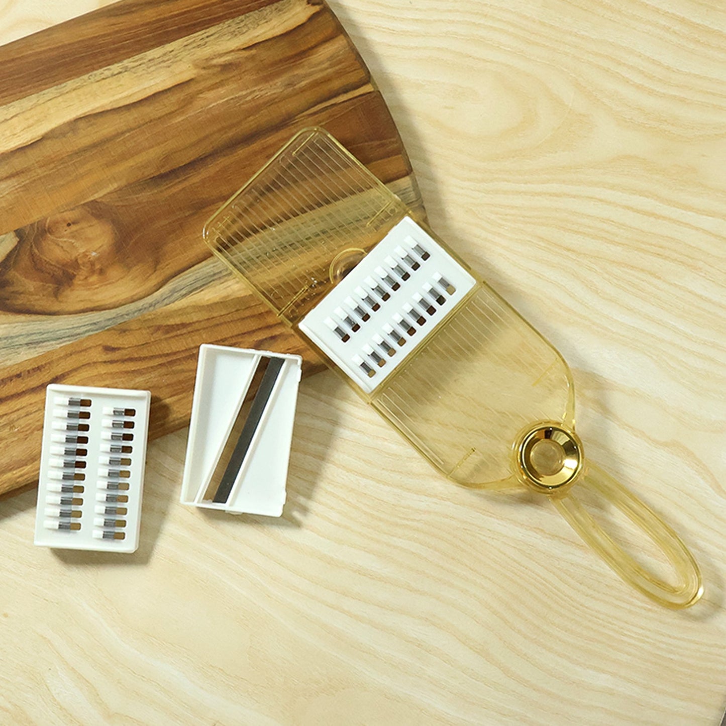 Kitchen tool for grating and slicing vegetables easily