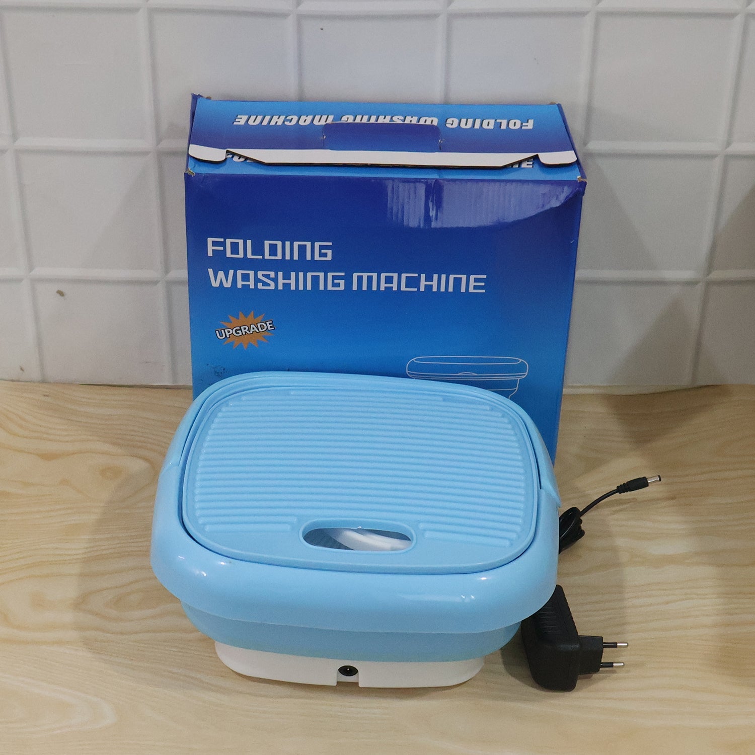 The Mini Portable Washing Machine gently washing delicate clothes, ensuring hygiene.