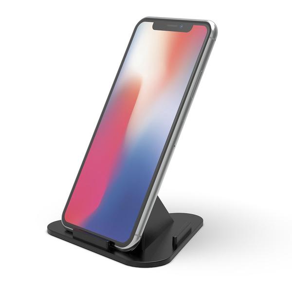User viewing a smartphone horizontally on a portable pyramid phone stand.