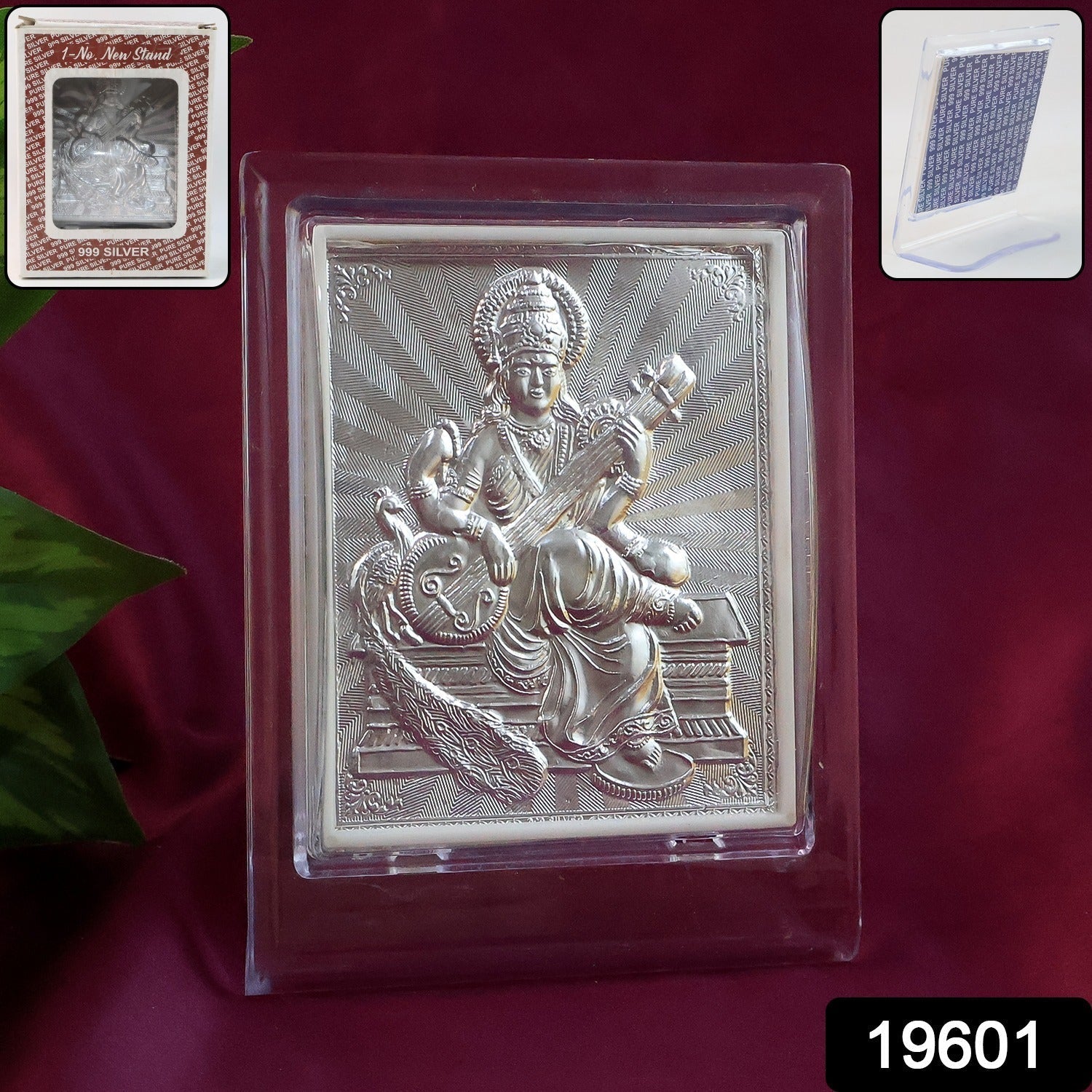 Close-up of embossed Goddess Saraswati detail on silver photo frame
