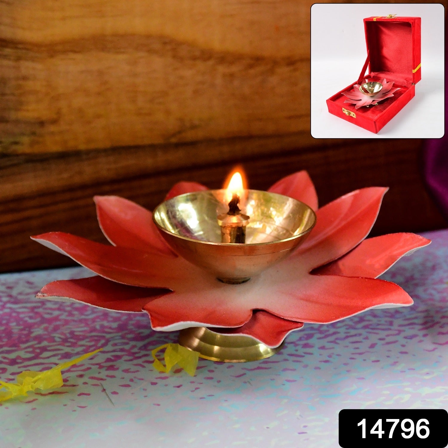 Close-up of lotus shaped brass oil diya showing polished brass bowl
