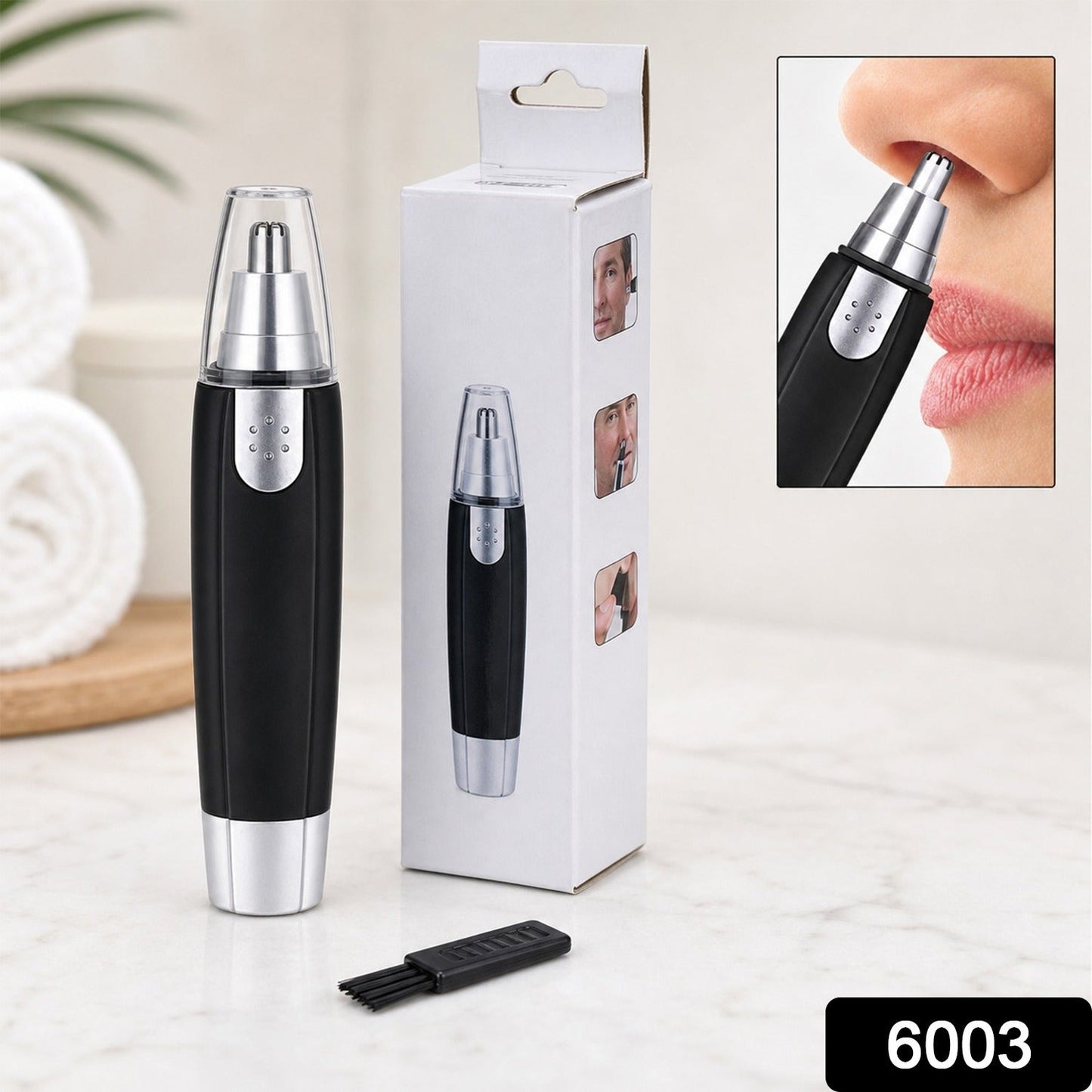 Close-up of the ear and nose hair trimmer showing its precise stainless steel blade.
