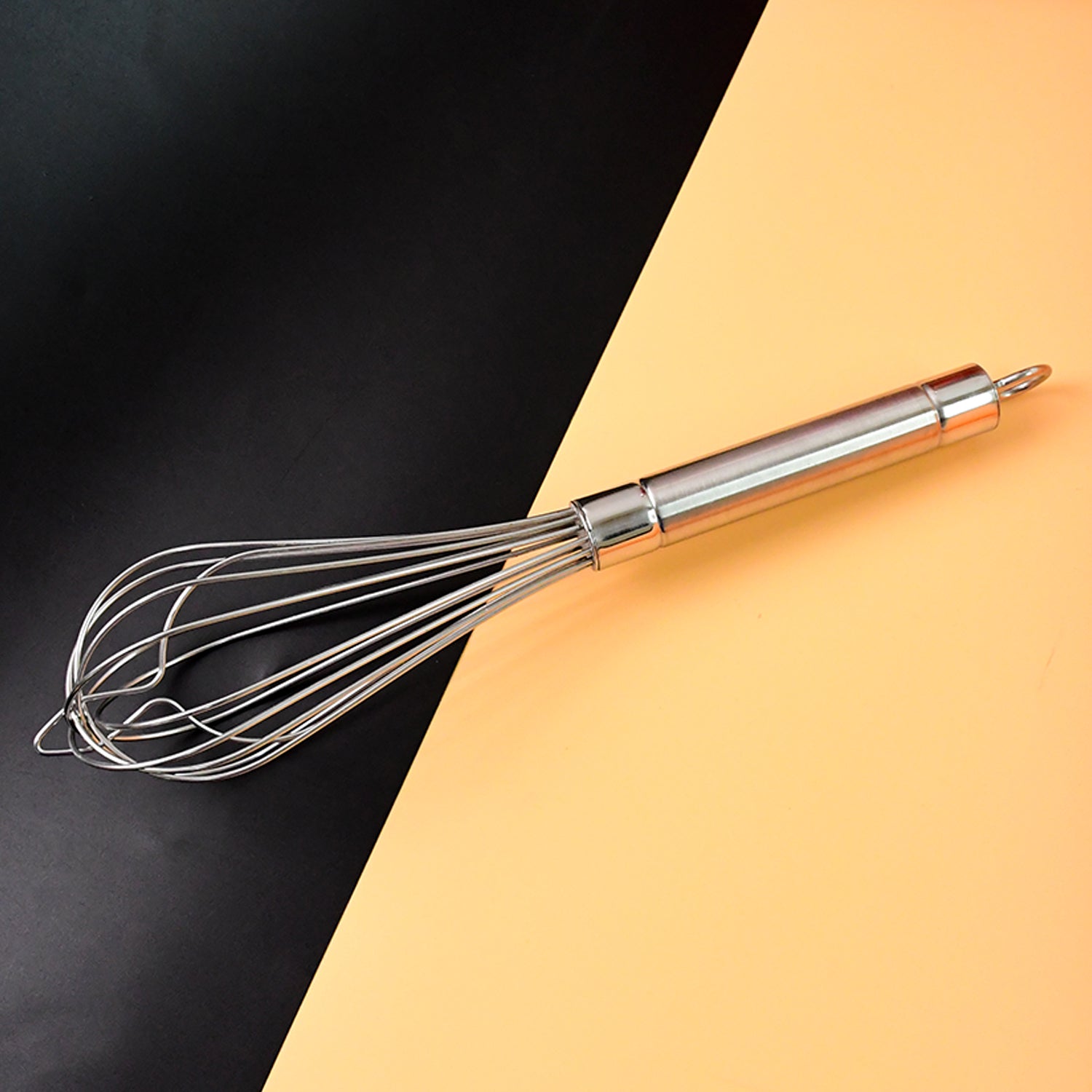 Metal hand whisk with polished stainless steel wires for aeration