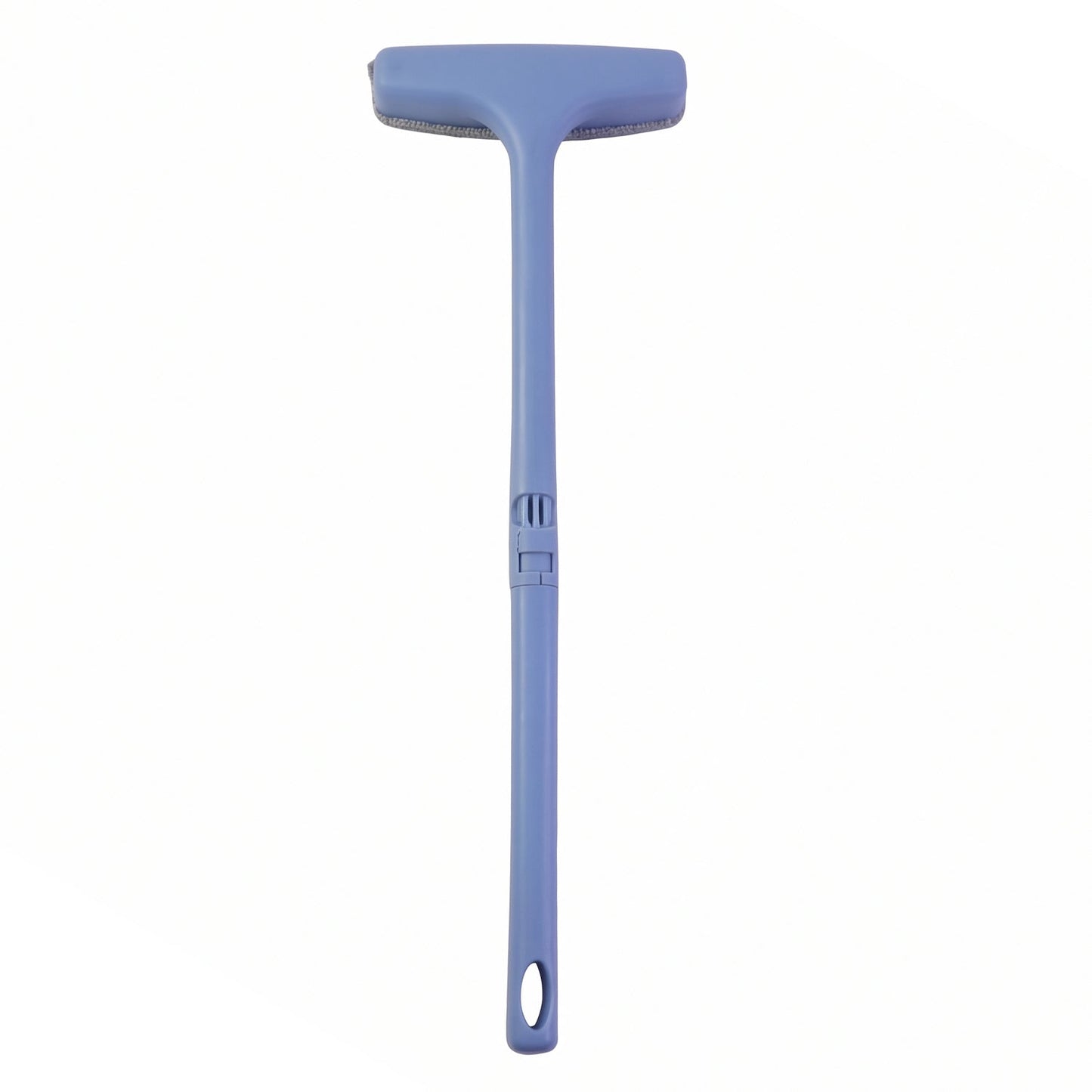 Side view highlighting the versatile brush, scraper, and cleaning pad features of the tool.