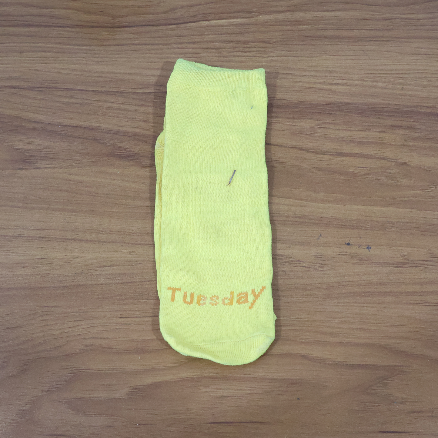 Lifestyle image of yellow casual crew socks in use