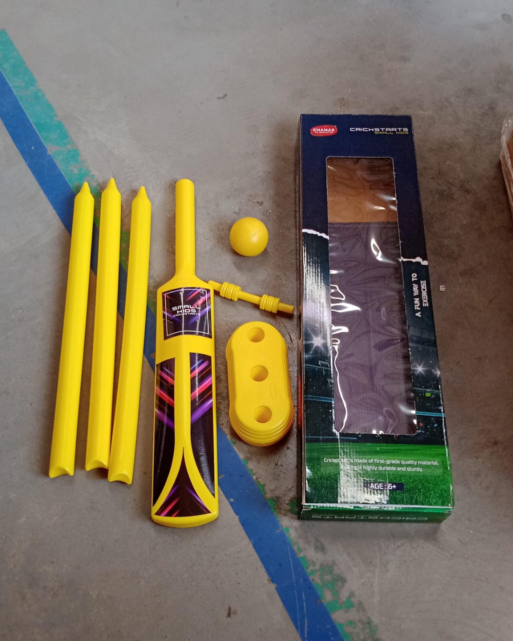The complete Aditi Kids Cricket Kit displayed on a vibrant background.