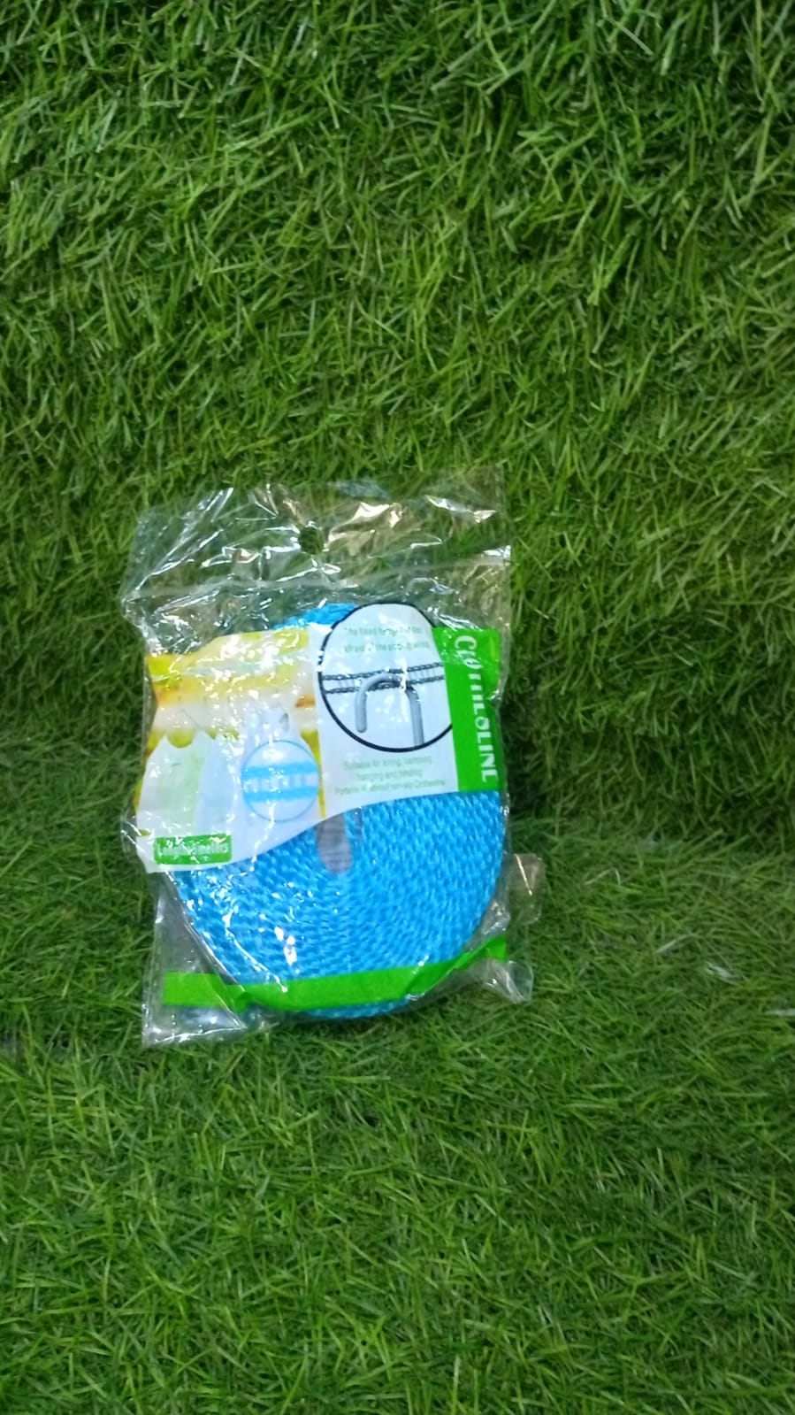 Clothes neatly hung on a 5m nylon clothesline with integrated hooks for efficient drying.