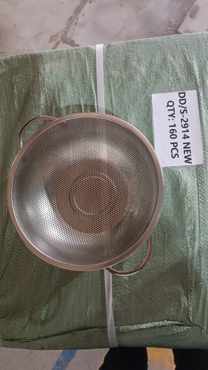 Angled view of the elegant stainless steel strainer bowl, perfect for Indian kitchens.