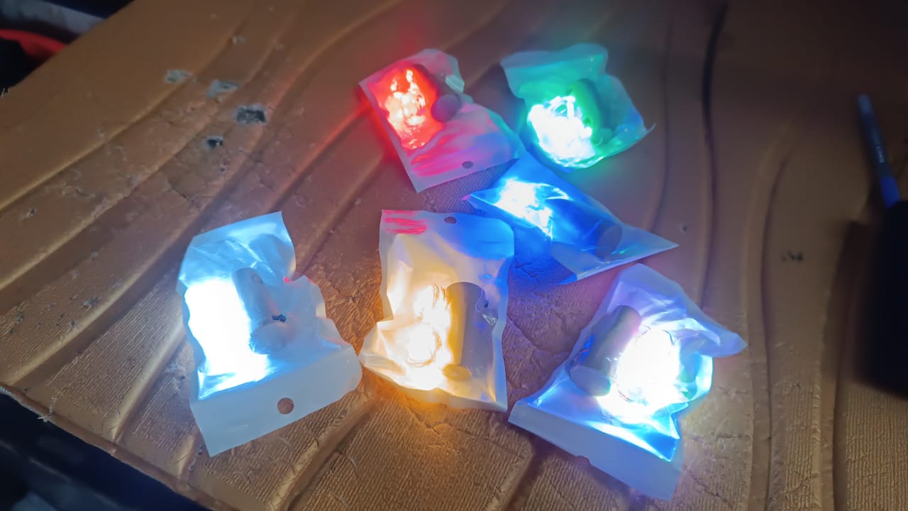 Decorative cork-shaped LED bottle lights arranged for festive ambiance