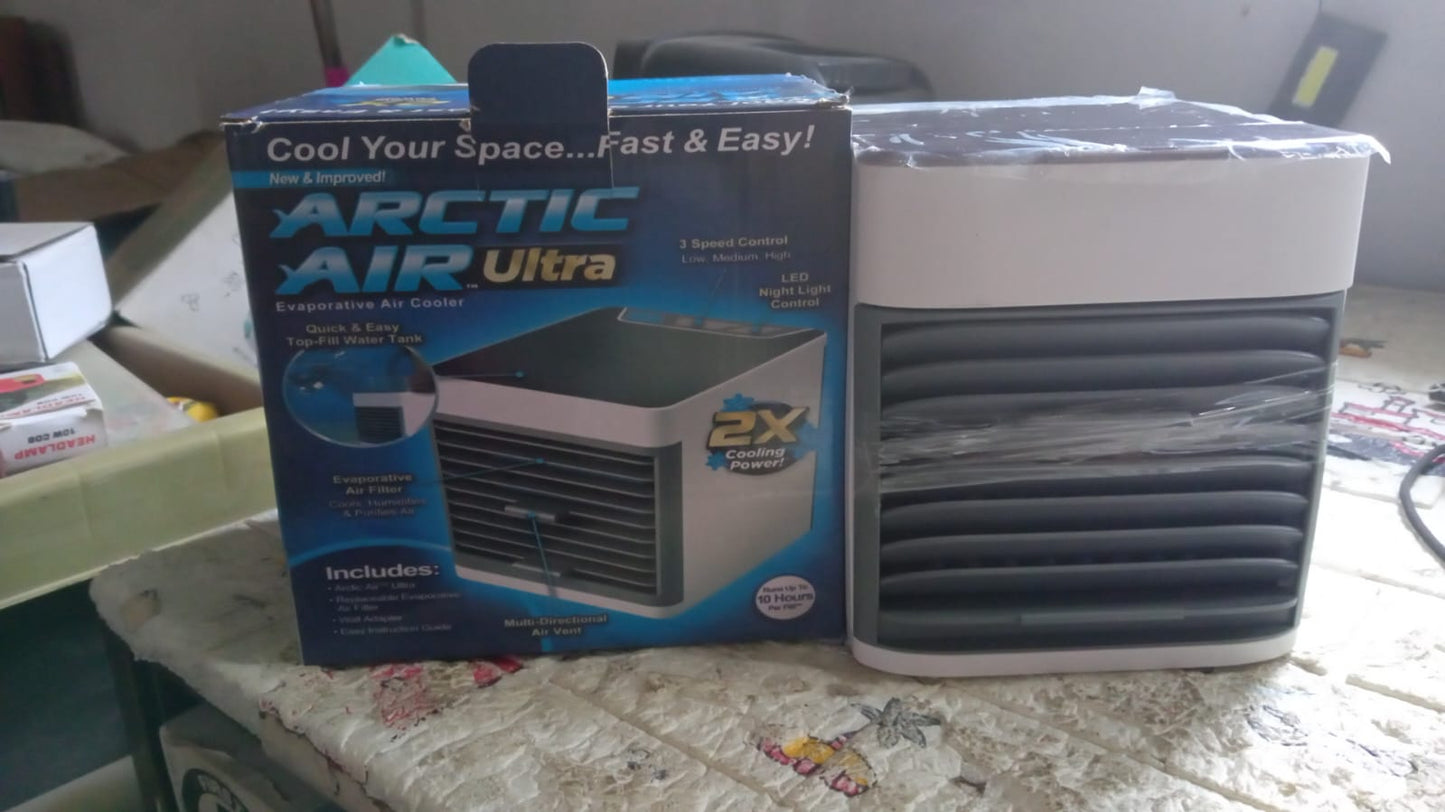 Compact mini cooler, perfect for a bedside table.