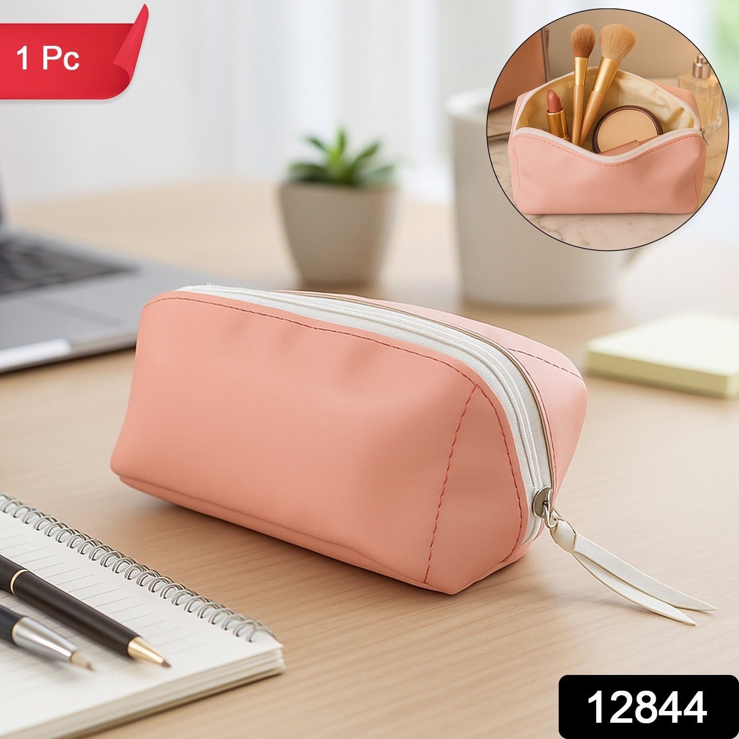Open PU leather cosmetic pouch showcasing its spacious main compartment and inner slip pocket.