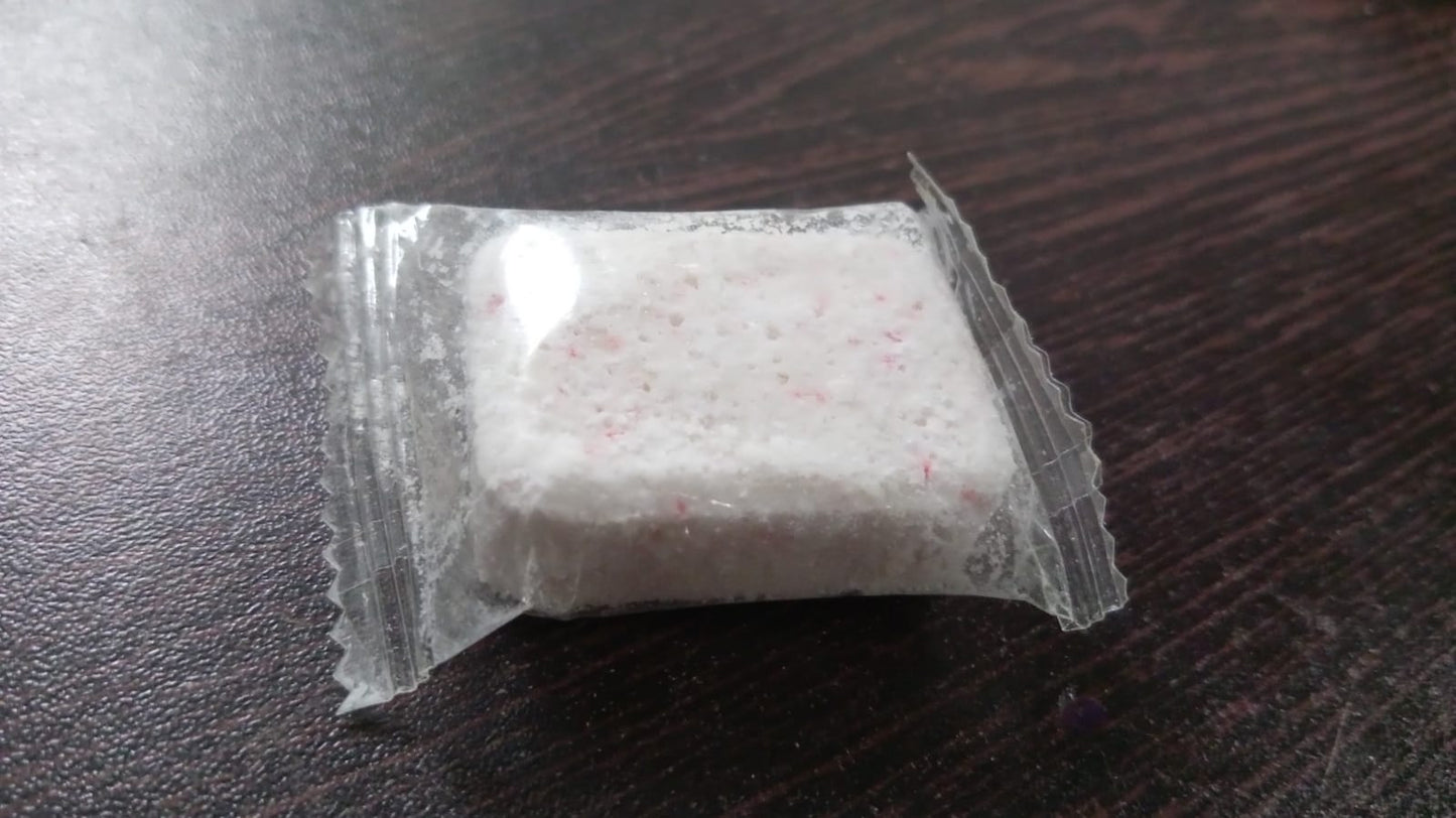 Single washing machine cleaning tablet for household use.