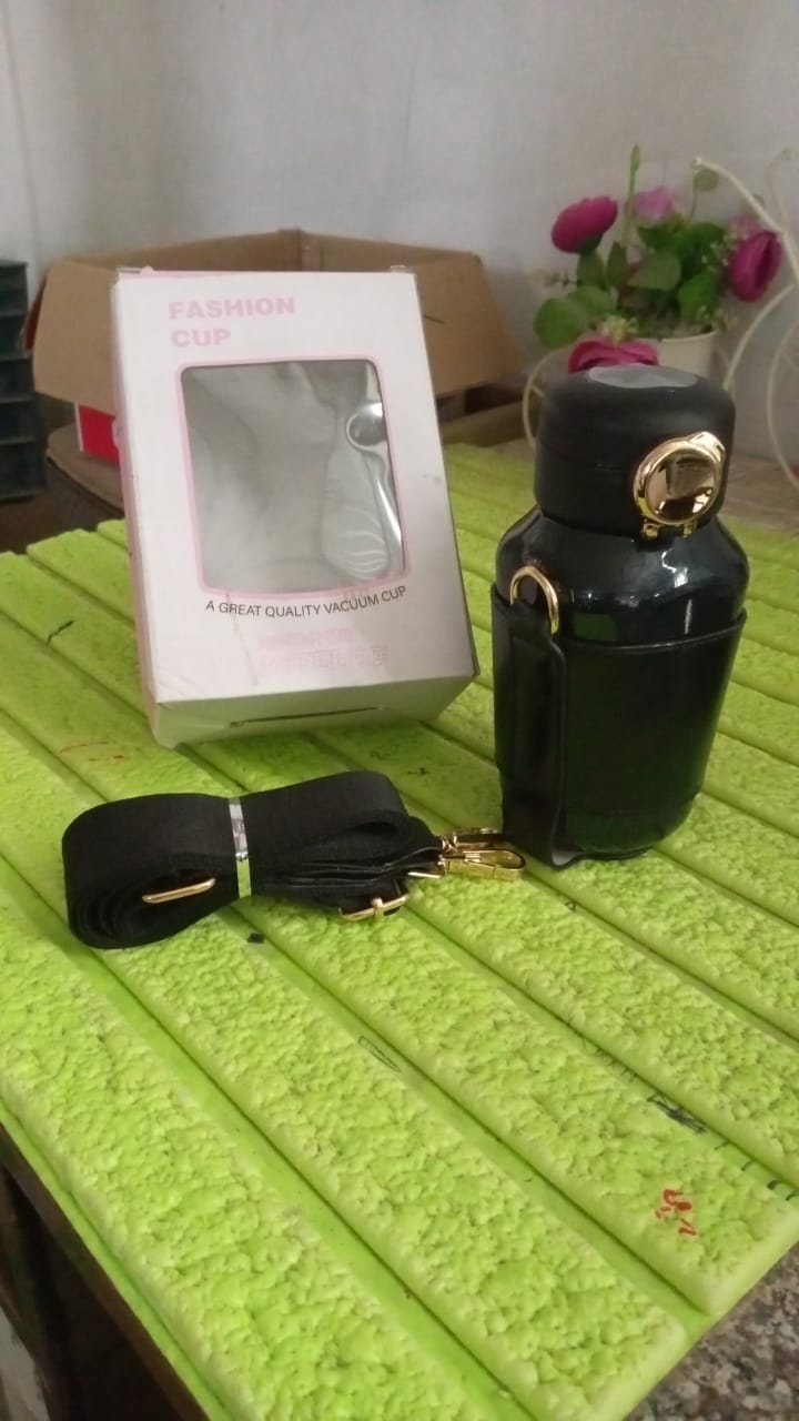 Side view of the Tumblo 420ML Smart Thermos Bottle, highlighting its sleek design.