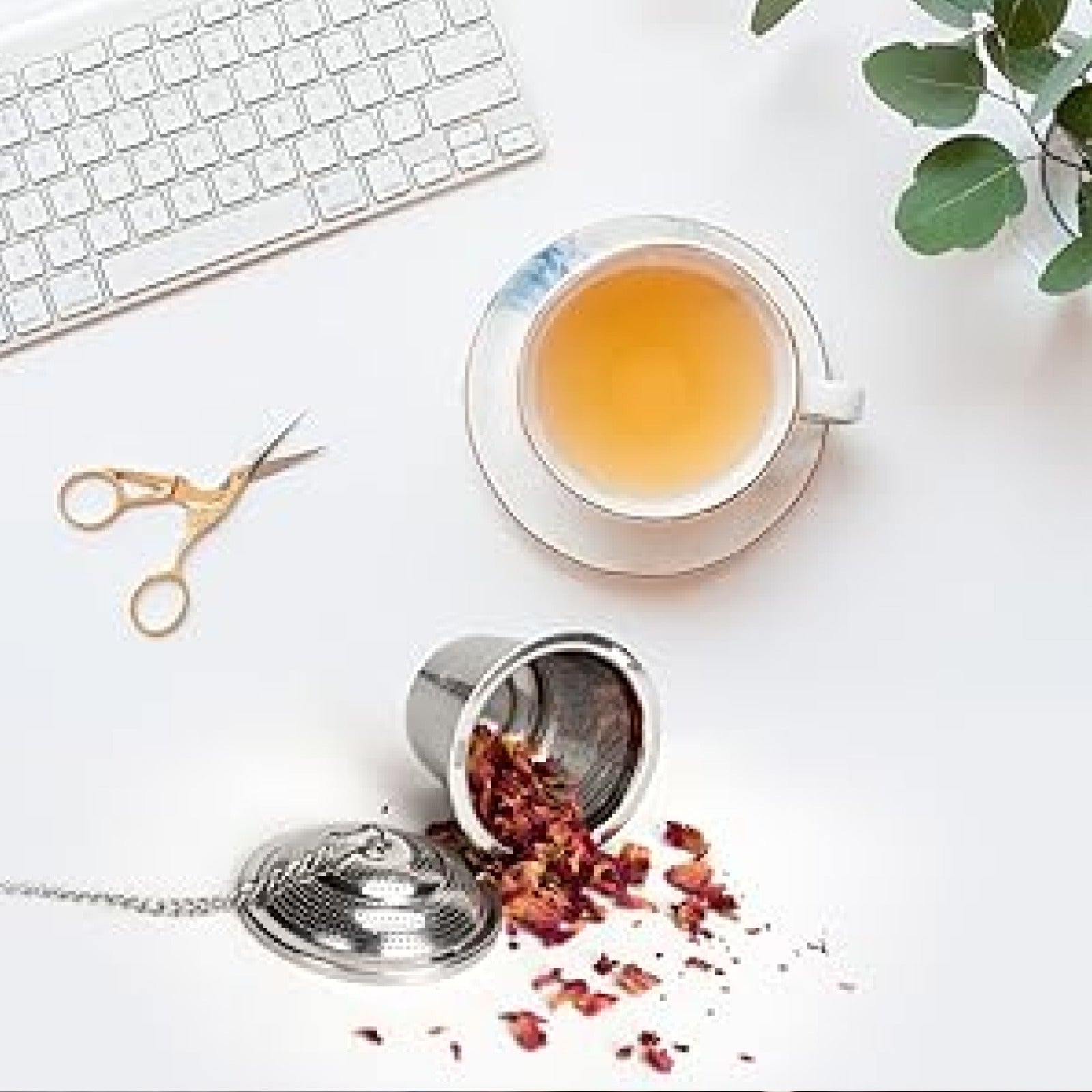 A versatile tea infuser ball made from high-quality stainless steel, ready for loose leaf tea.