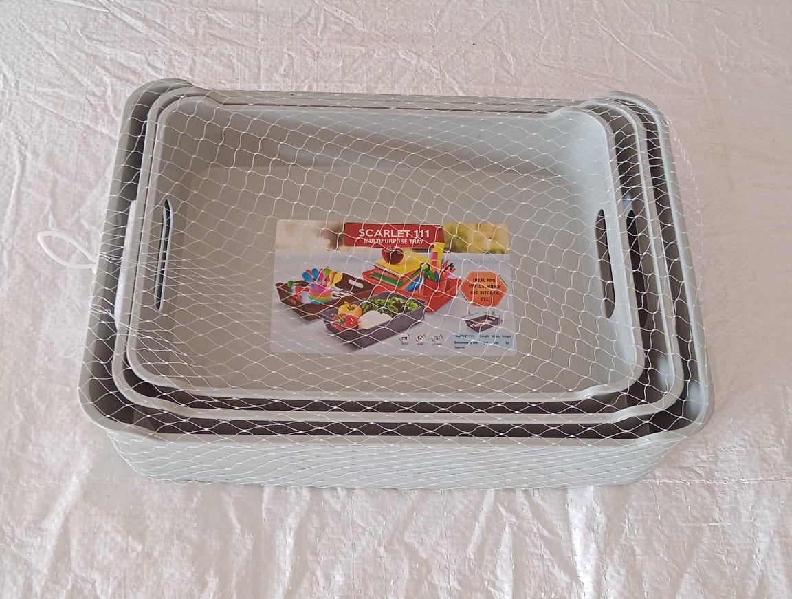 Close-up view of the ergonomic handle on a plastic storage tray