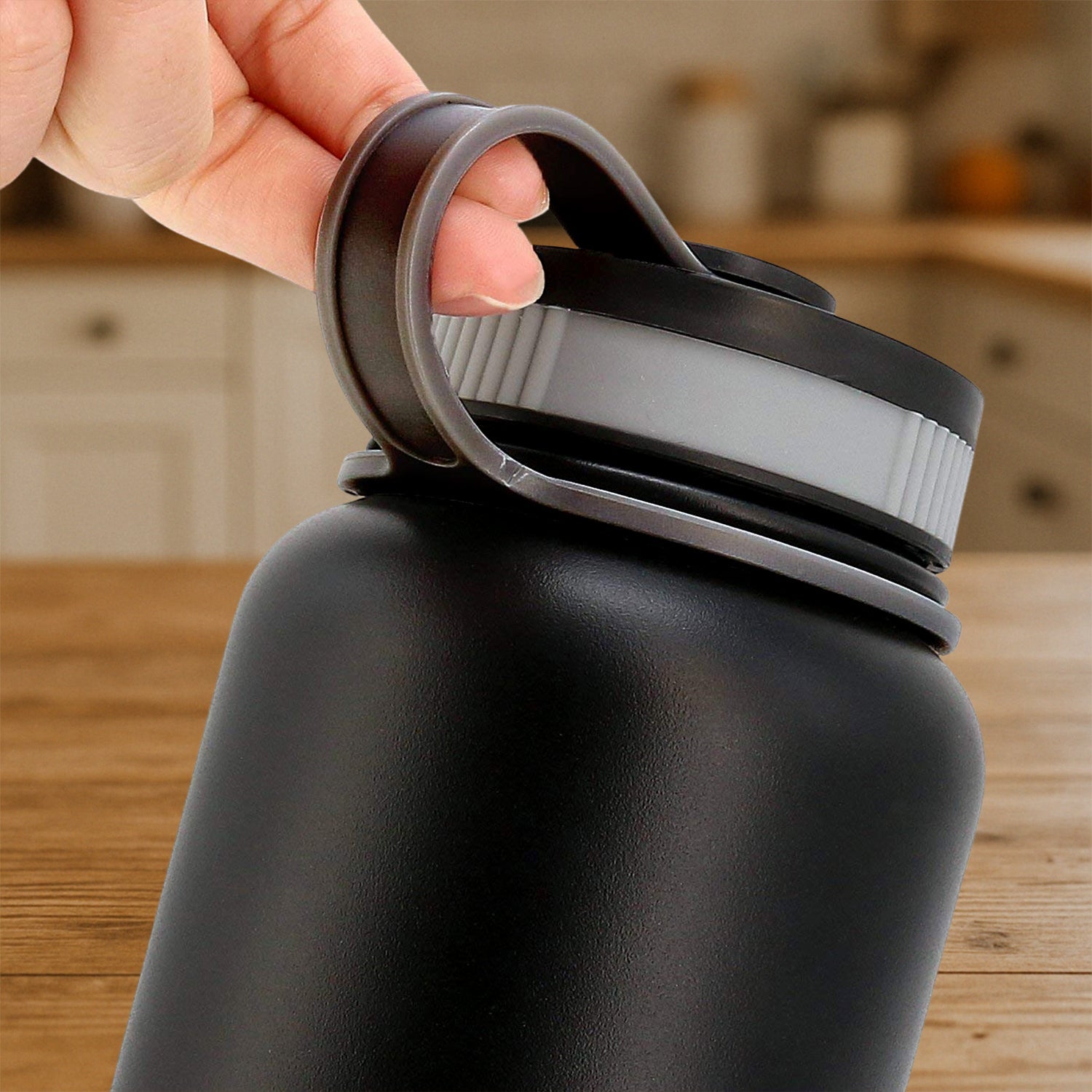 Black sports water bottle with durable stainless steel body