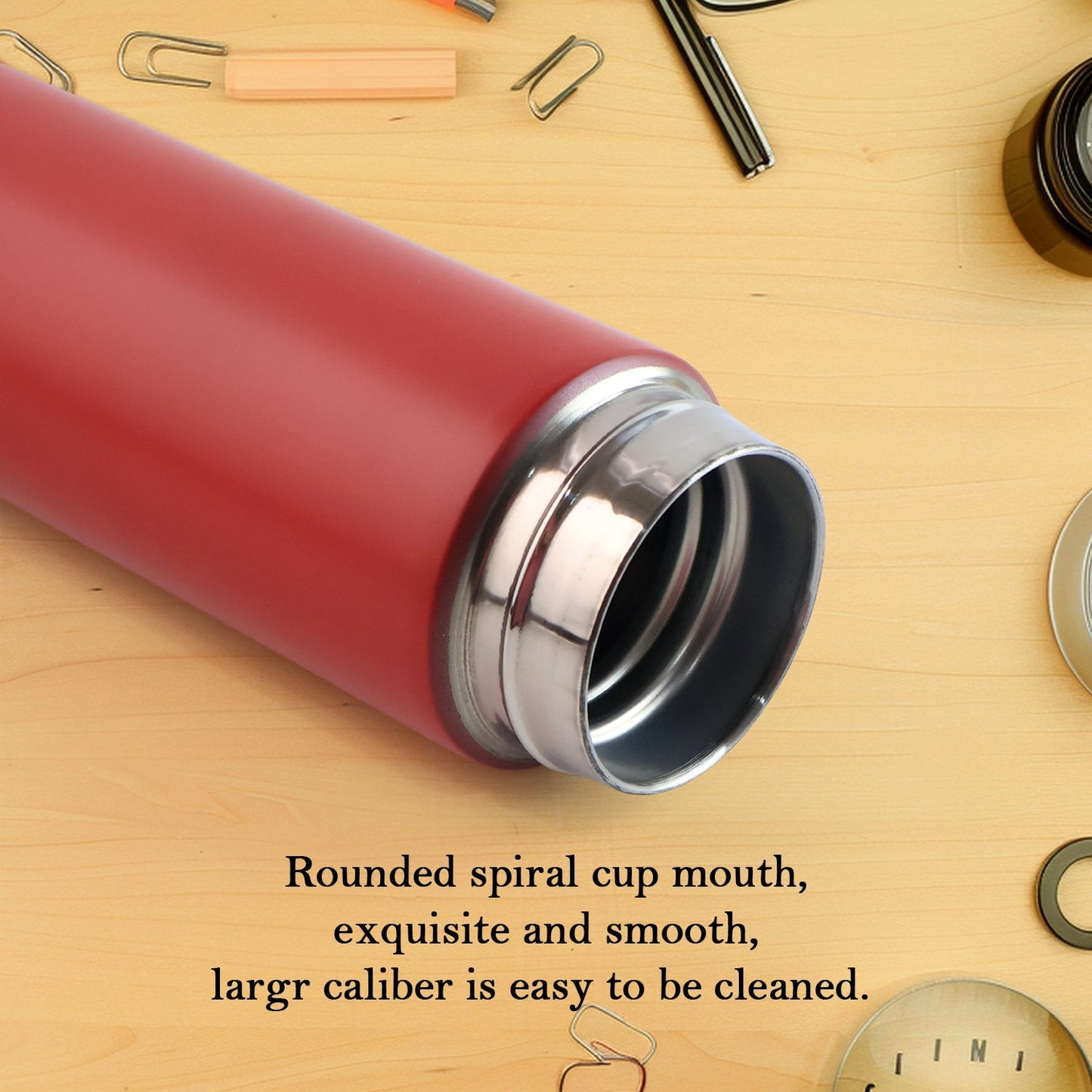 Red stainless steel vacuum insulated water bottle for hot and cold drinks.
