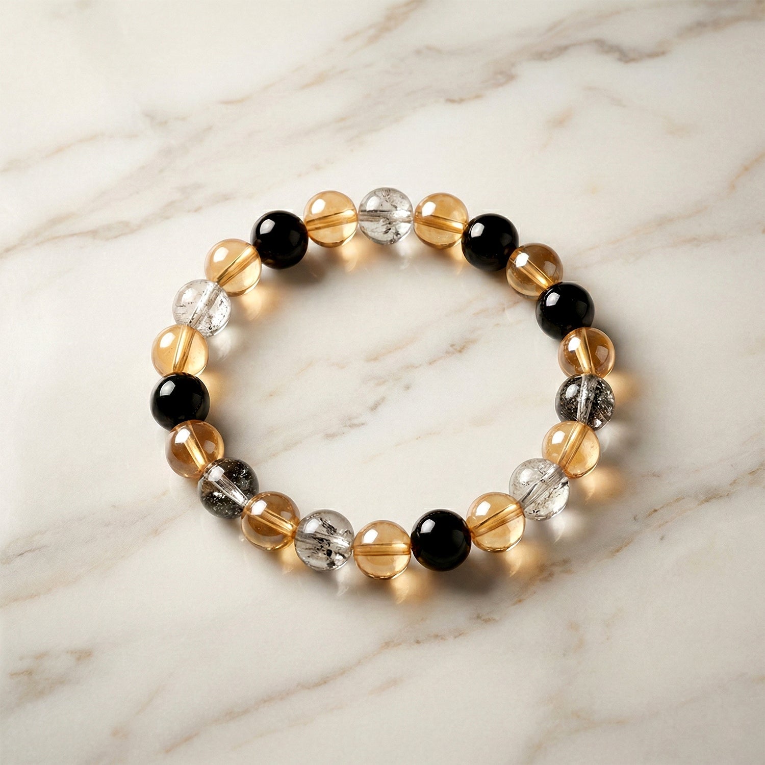 Close-up image of glossy crystal beads on the Dual-Tone Stretch Bracelet